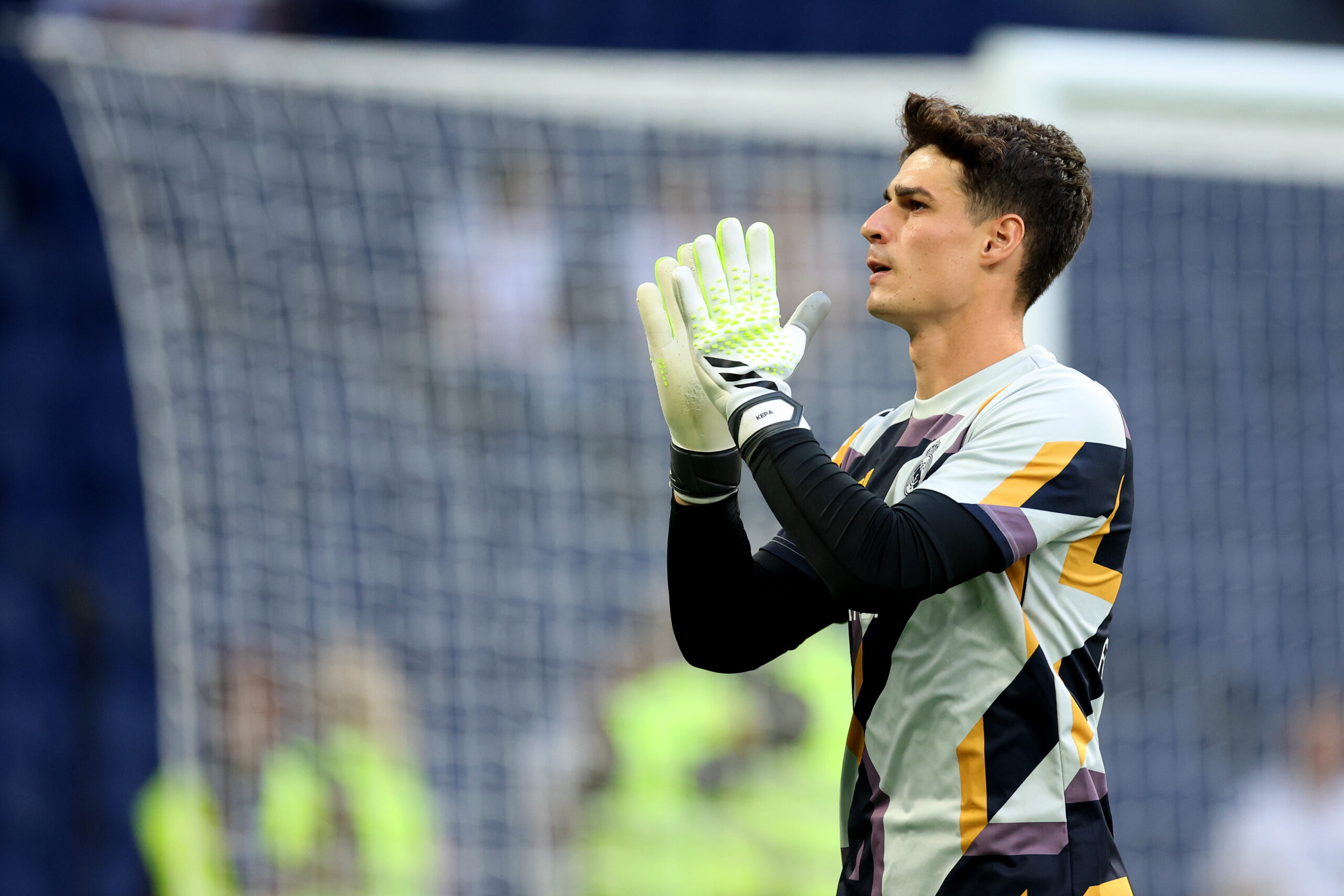 MADRID, SPAIN - OCTOBER 07: Kepa Arrizabalaga of Real Madrid warms up prior to the LaLiga EA Sports match between Real Madrid CF and CA Osasuna at Estadio Santiago Bernabeu on October 07, 2023 in Madrid, Spain.