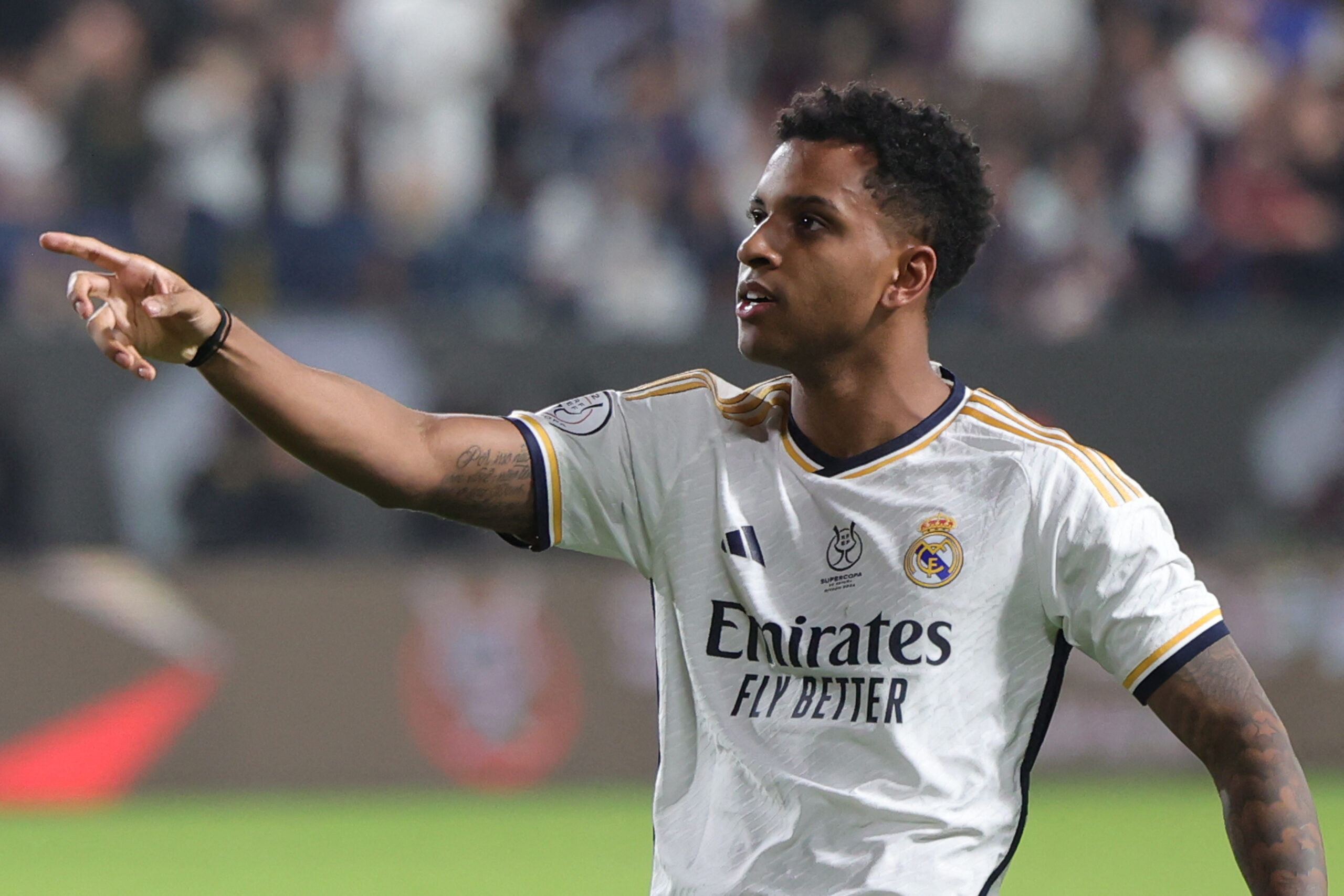 Real Madrid's Brazilian forward #11 Rodrygo celebrates after scoring his team's fourth goal during the Spanish Super Cup final football match between Real Madrid and Barcelona at the Al-Awwal Park Stadium in Riyadh, on January 14, 2024.