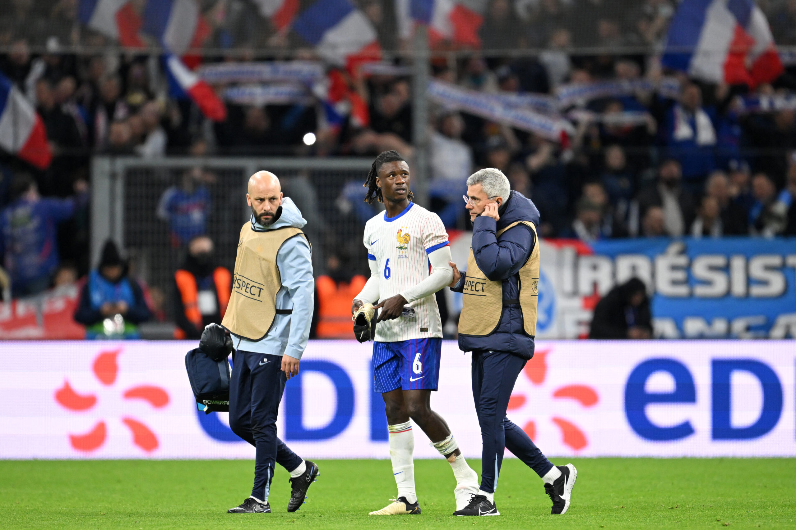 France's midfielder #06 Eduardo Camavinga walks off the pitch after an injury during the friendly football match between France and Chile at the Stade Velodrome in Marseille, southern France, on March 26, 2024.
