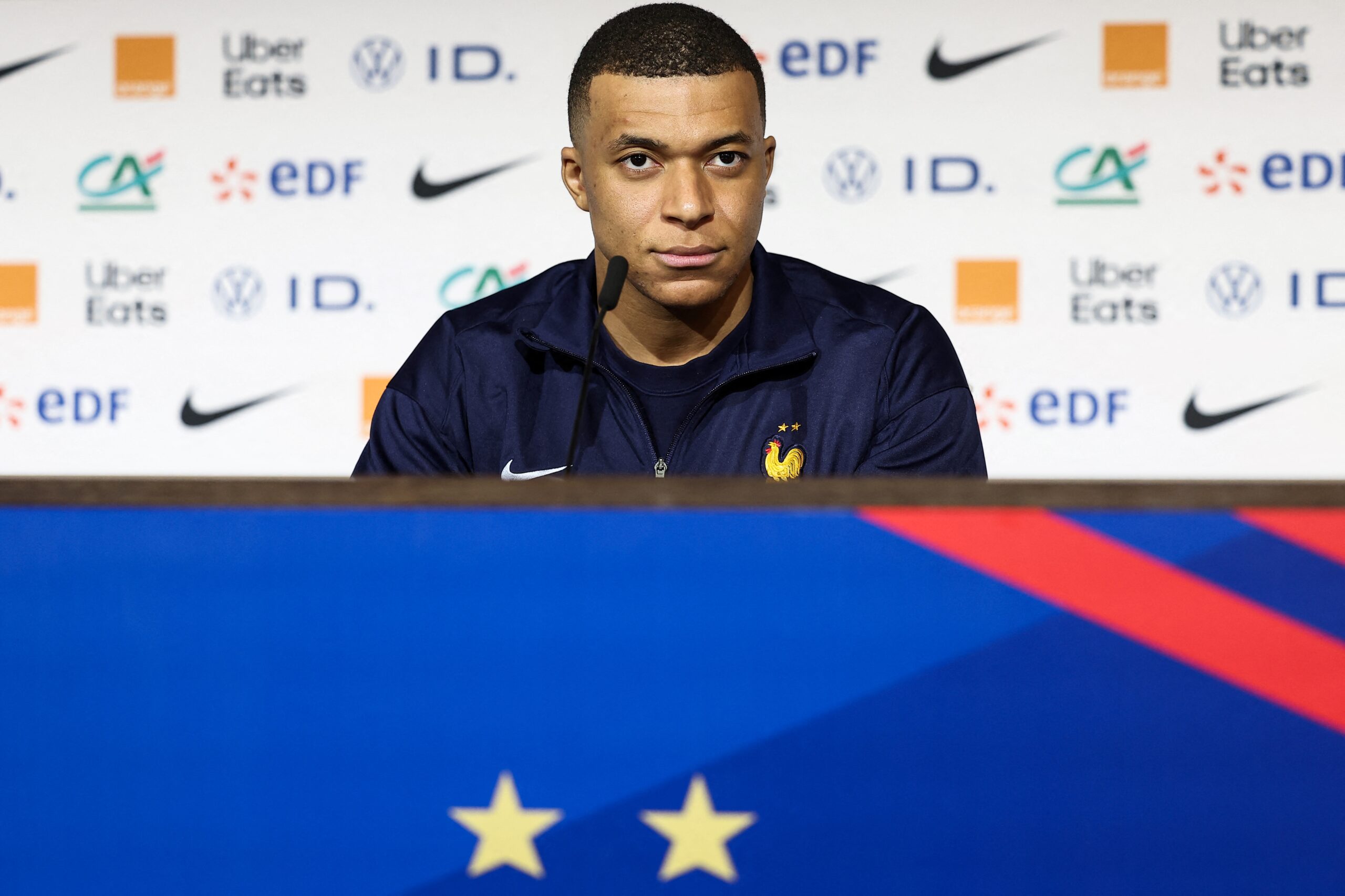 France's forward Kylian Mbappe speaks during a press conference at the Groupama Stadium in Decines-Charpieu, near Lyon, on March 22, 2024, on the eve of the friendly football match between France and Germany.