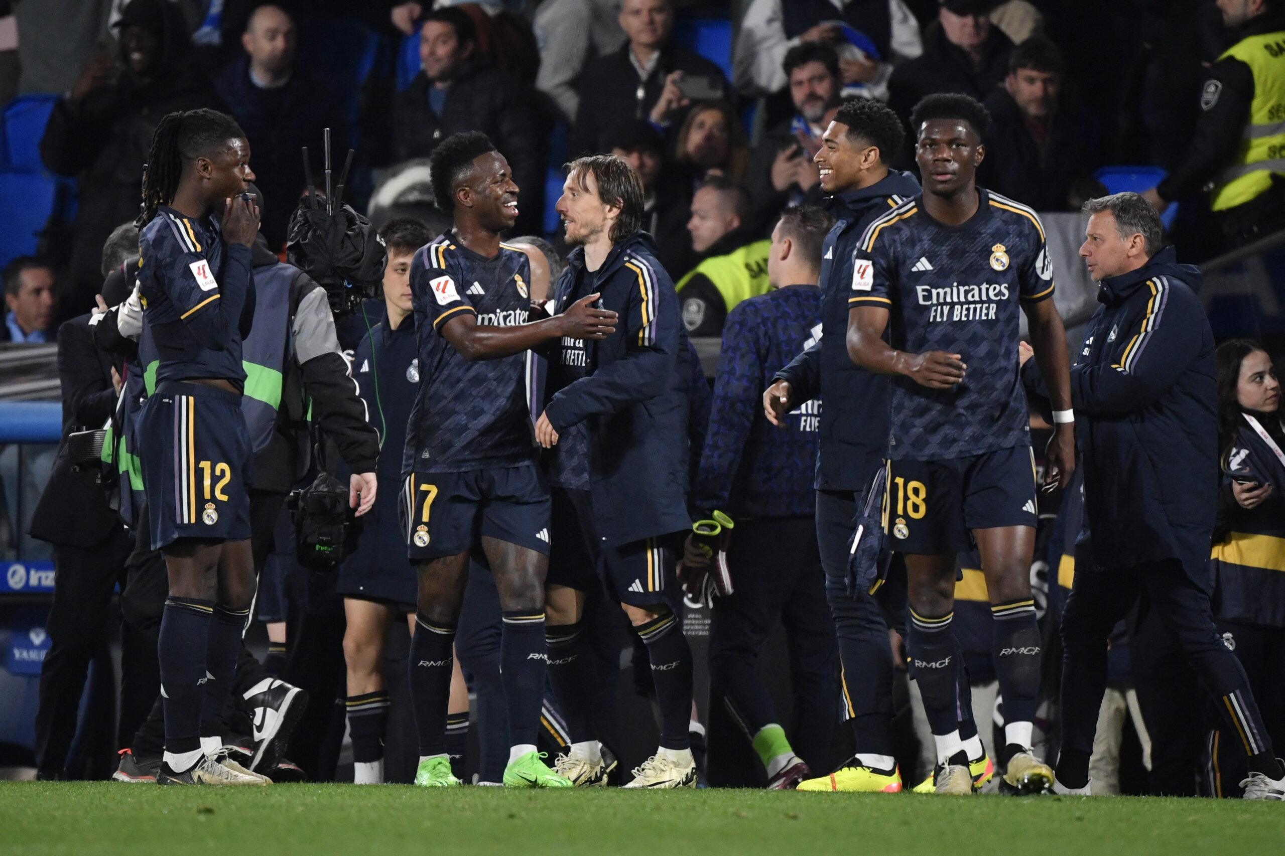 Real Madrid's players celebrate their victory at the end of the Spanish league football match between Real Sociedad and Real Real Madrid CF at the Anoeta stadium in San Sebastian on April 26, 2024.