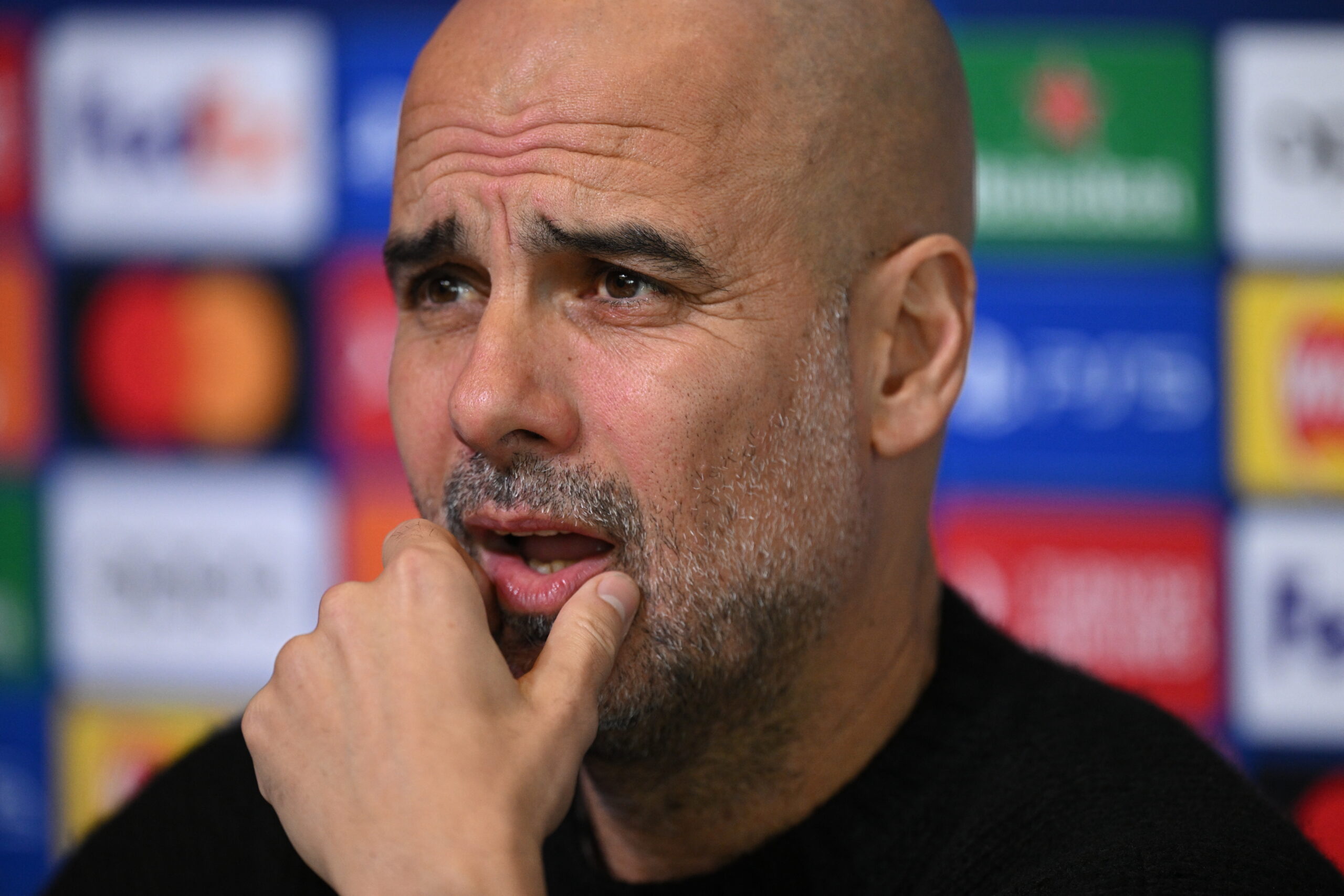 Manchester City's Spanish manager Pep Guardiola attends a press conference at Manchester City's training ground in north-west England on April 16, 2024, on the eve of their UEFA Champions League Group quarter-final second-leg football match against Real Madrid.