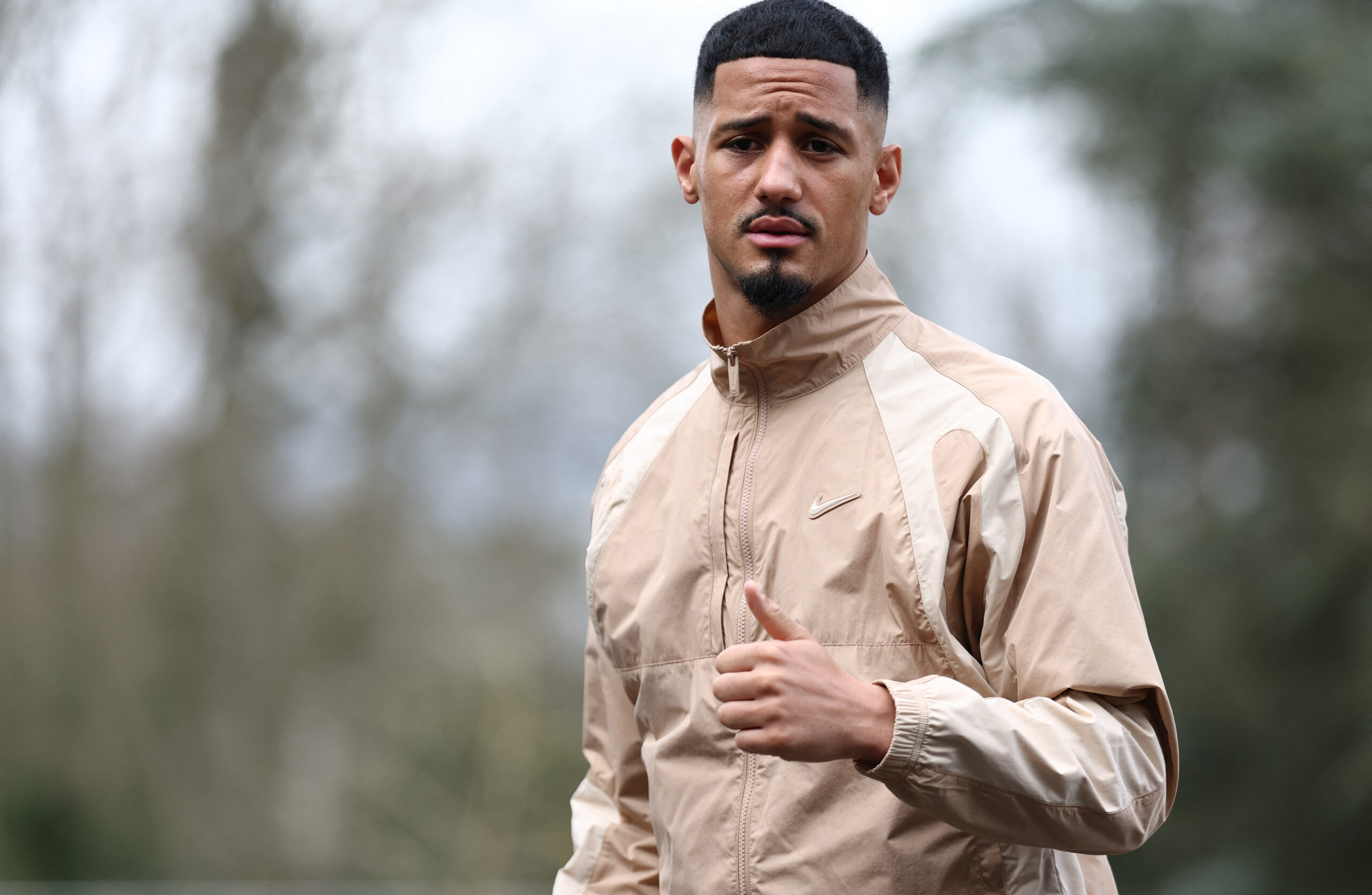 France's defender William Saliba arrives to take part in the French team's preparation for upcoming friendly football matches in Clairefontaine-en-Yvelines on March 18, 2024.