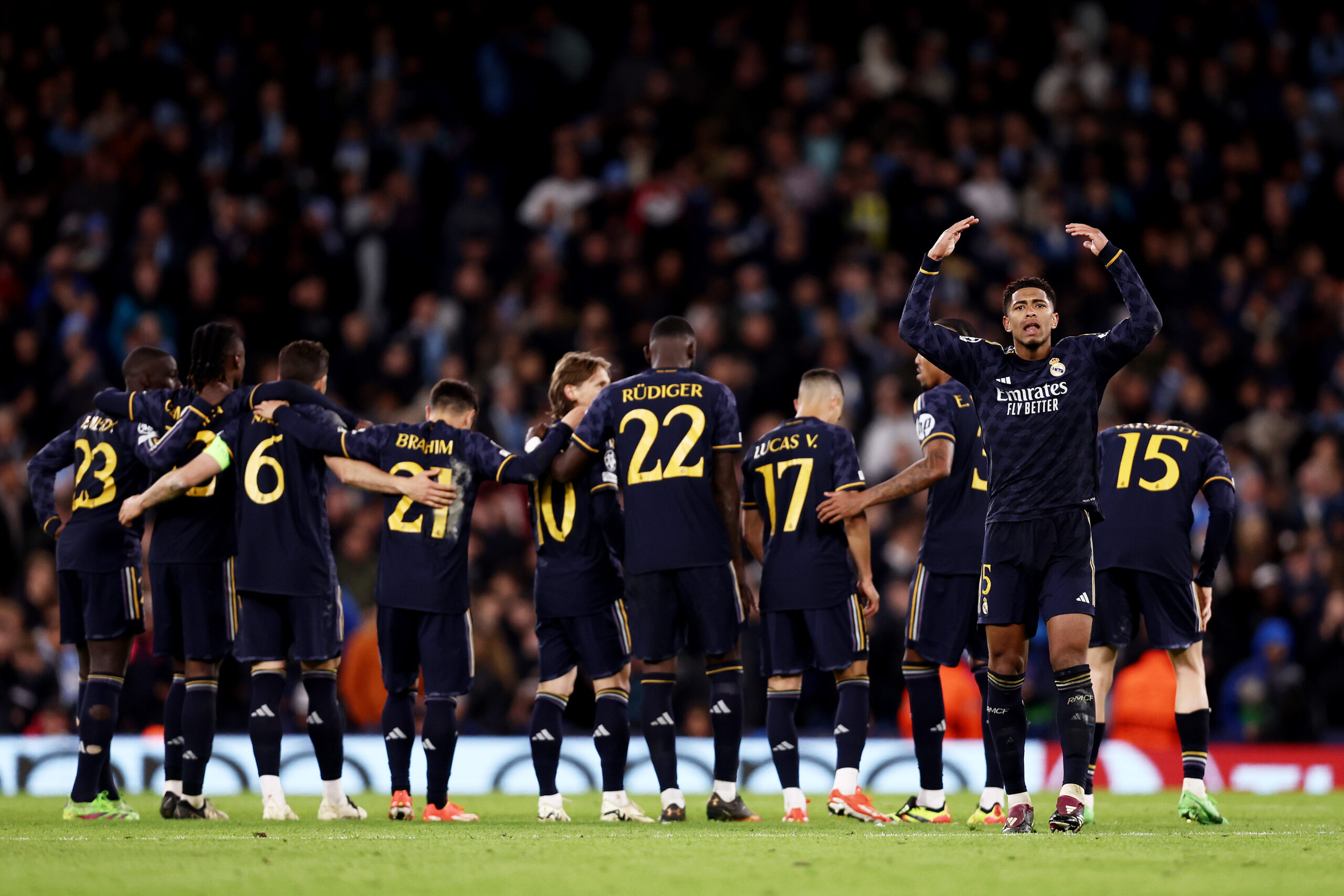 MANCHESTER, ENGLAND - APRIL 17: Jude Bellingham of Real Madrid celebrates scoring the team's second penalty in the penalty shoot out during the UEFA Champions League quarter-final second leg match between Manchester City and Real Madrid CF at Etihad Stadium on April 17, 2024 in Manchester, England.