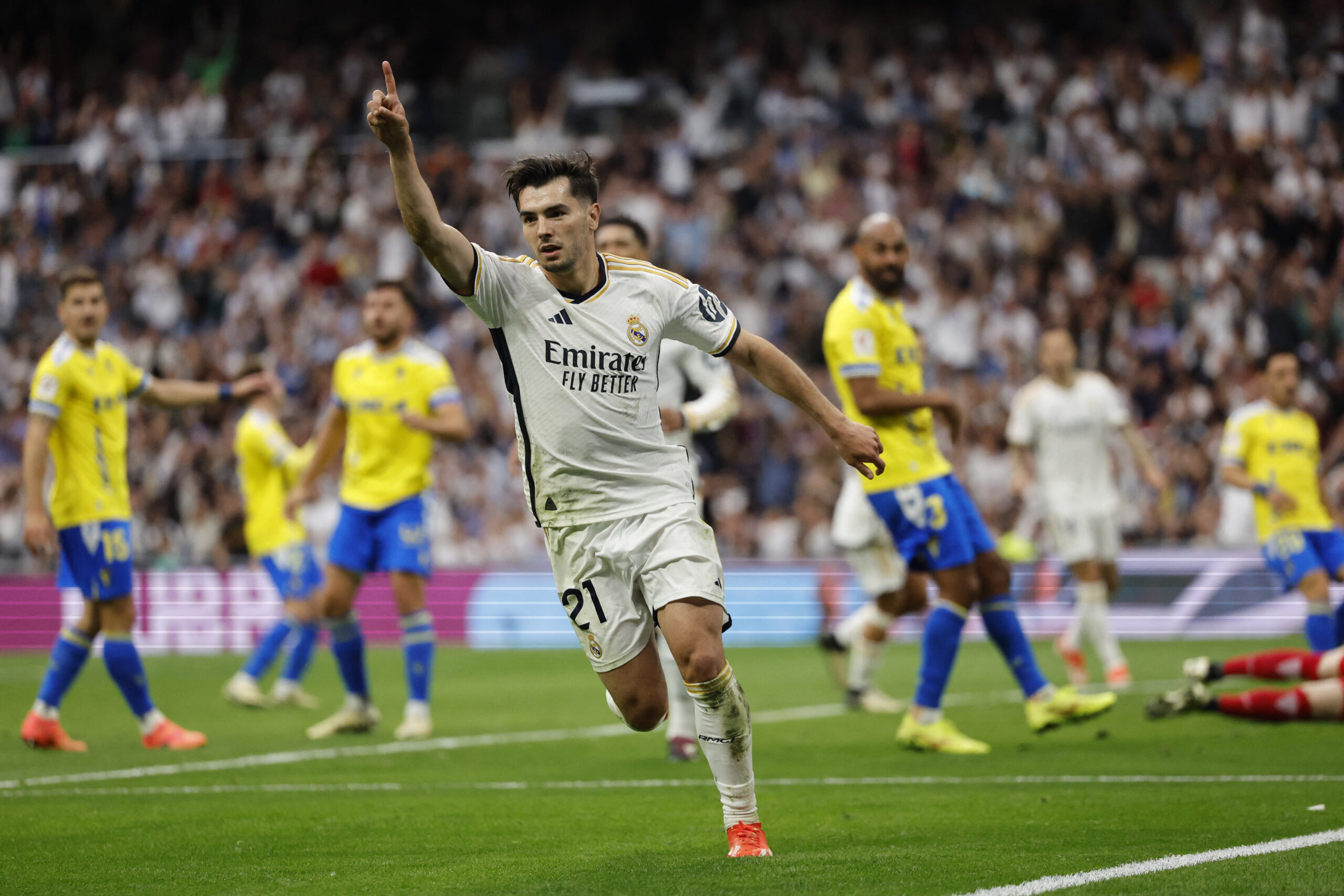 TOPSHOT - Real Madrid's Spanish forward #21 Brahim Diaz celebrates scoring the opening goal during the Spanish league football match between Real Madrid CF and Cadiz CF at the Santiago Bernabeu stadium in Madrid on May 4, 2024.