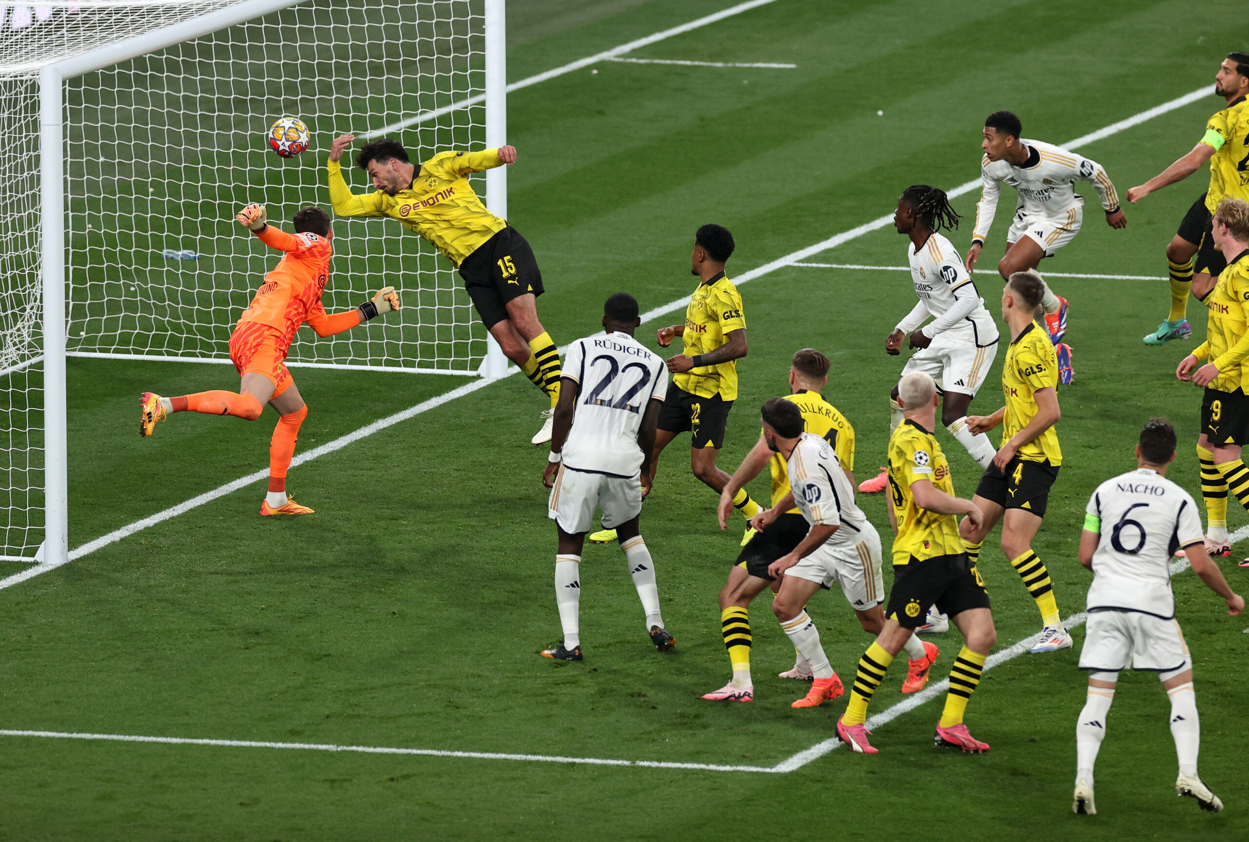 LONDON, ENGLAND - JUNE 01: Gregor Kobel and Mats Hummels of Borussia Dortmund attempt to stop the ball, as Daniel Carvajal of Real Madrid scores his team's first goal with a header during the UEFA Champions League 2023/24 Final match between Borussia Dortmund and Real Madrid CF at Wembley Stadium on June 01, 2024 in London, England.