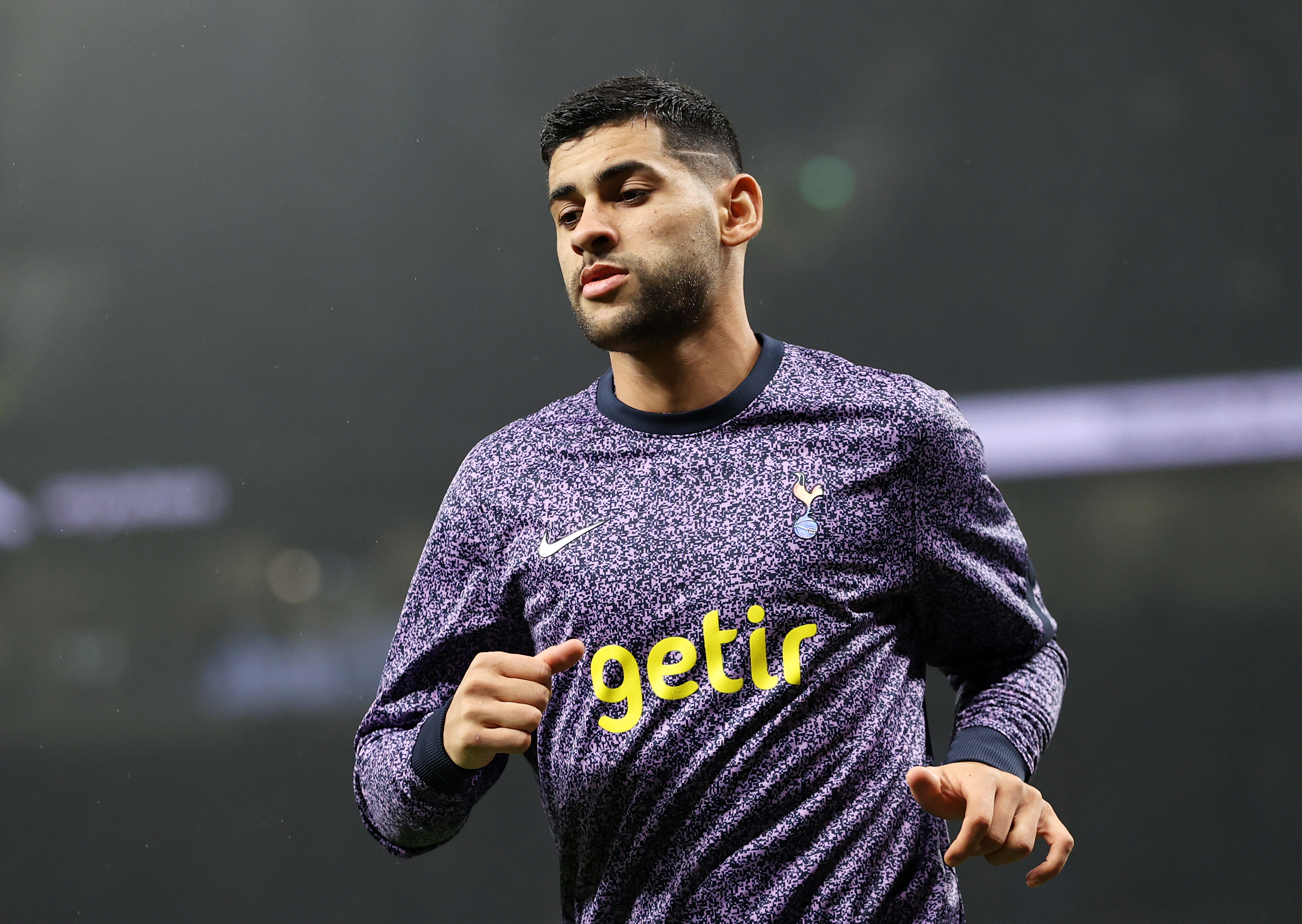 LONDON, ENGLAND - DECEMBER 07: Cristian Romero of Tottenham Hotspur warms up prior to the Premier League match between Tottenham Hotspur and West Ham United at Tottenham Hotspur Stadium on December 07, 2023 in London, England.