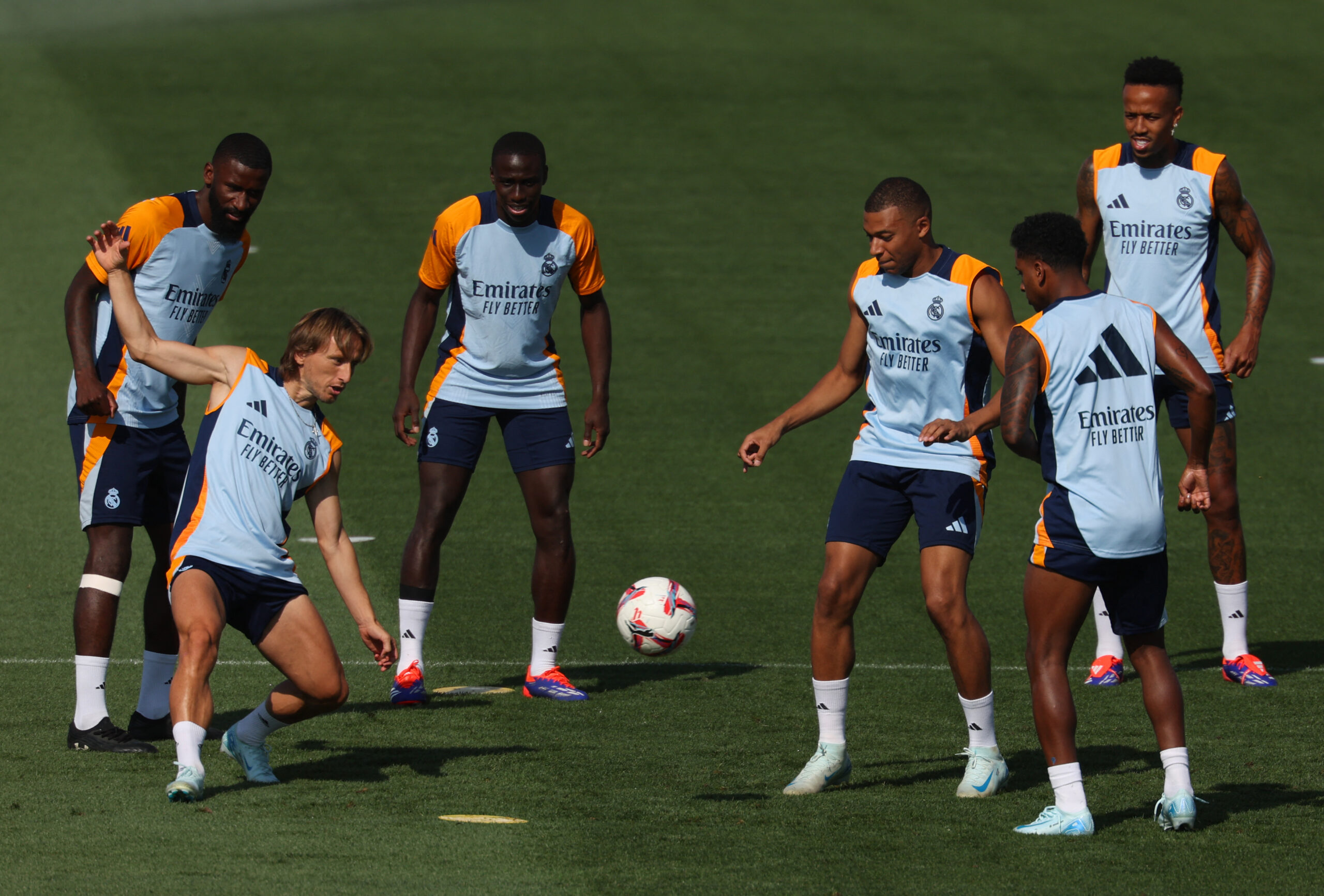 (From L) Real Madrid's German defender #22 Antonio Ruediger, Real Madrid's Croatian midfielder #10 Luka Modric, Real Madrid's French defender #23 Ferland Mendy, Real Madrid's French forward #09 Kylian Mbappe, Real Madrid's Brazilian forward #11 Rodrygo and Real Madrid's Brazilian defender #03 Eder Militao take part in a training session at the club's training ground of Valdebebas ahead of their Liga football match against Real Valladolid FC, in Madrid on August 23, 2024.