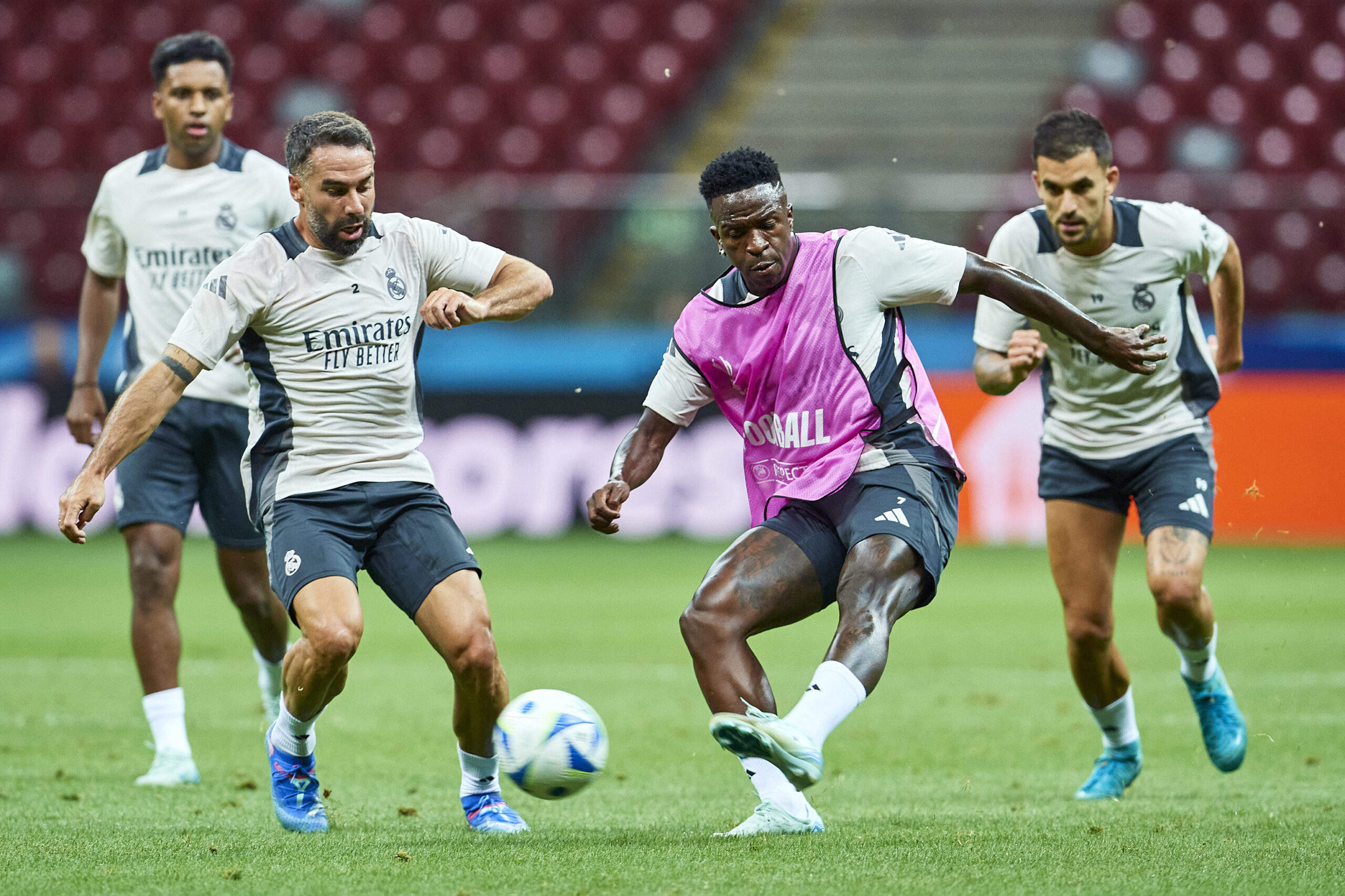 WARSAW, POLAND - AUGUST 13: (R) Vinicius Junior from Real Madrid fights for the ball while training session before UEFA Super Cup 2024 at National Stadium on August 13, 2024 in Warsaw, Poland.