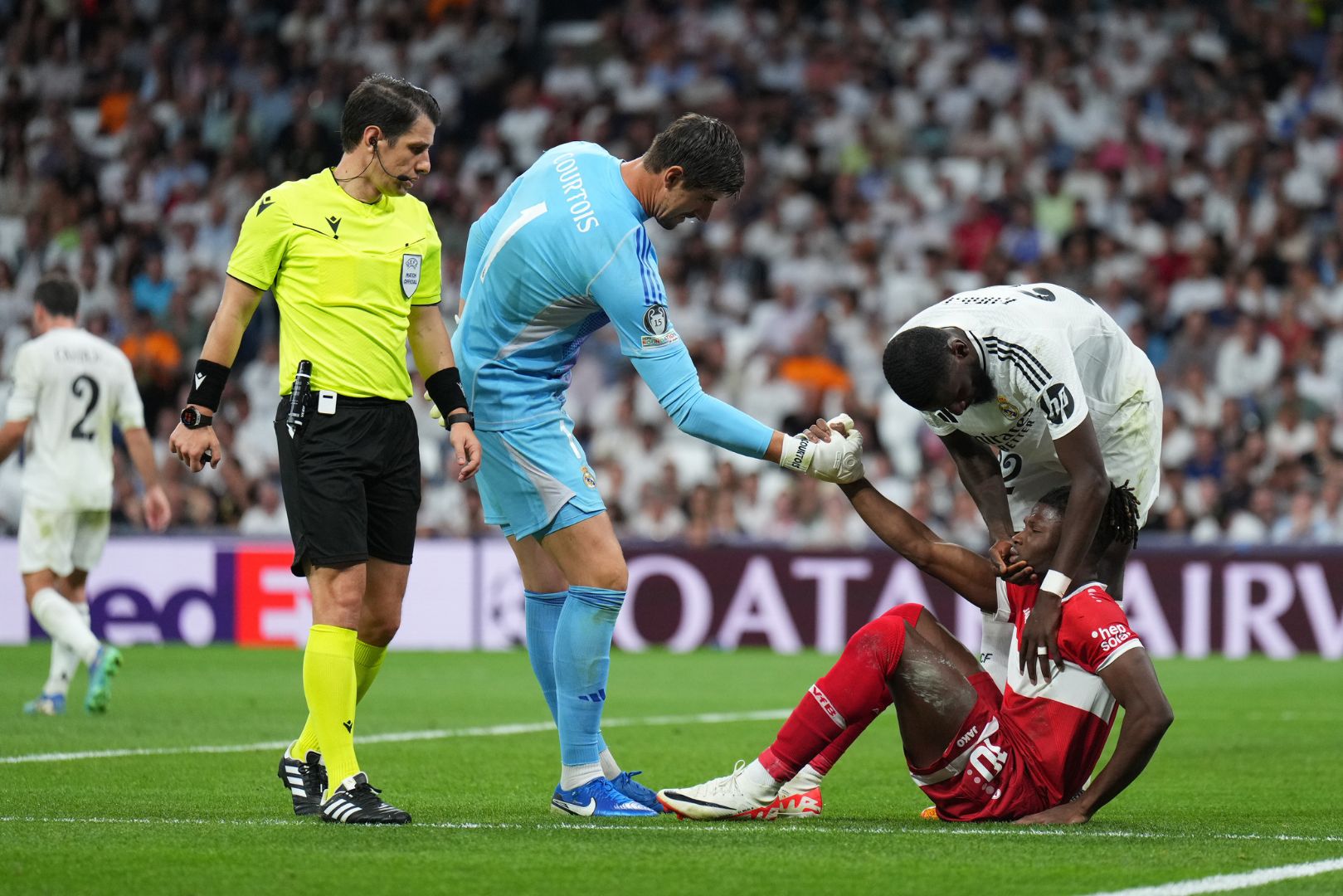MADRID, SPAIN - SEPTEMBER 17: El Bilal Toure of VfB Stuttgart interacts with Thibaut Courtois and Antonio Ruediger of Real Madrid during the UEFA Champions League 2024/25 League Phase MD1 match between Real Madrid CF and VfB Stuttgart at Estadio Santiago Bernabeu on September 17, 2024 in Madrid, Spain.