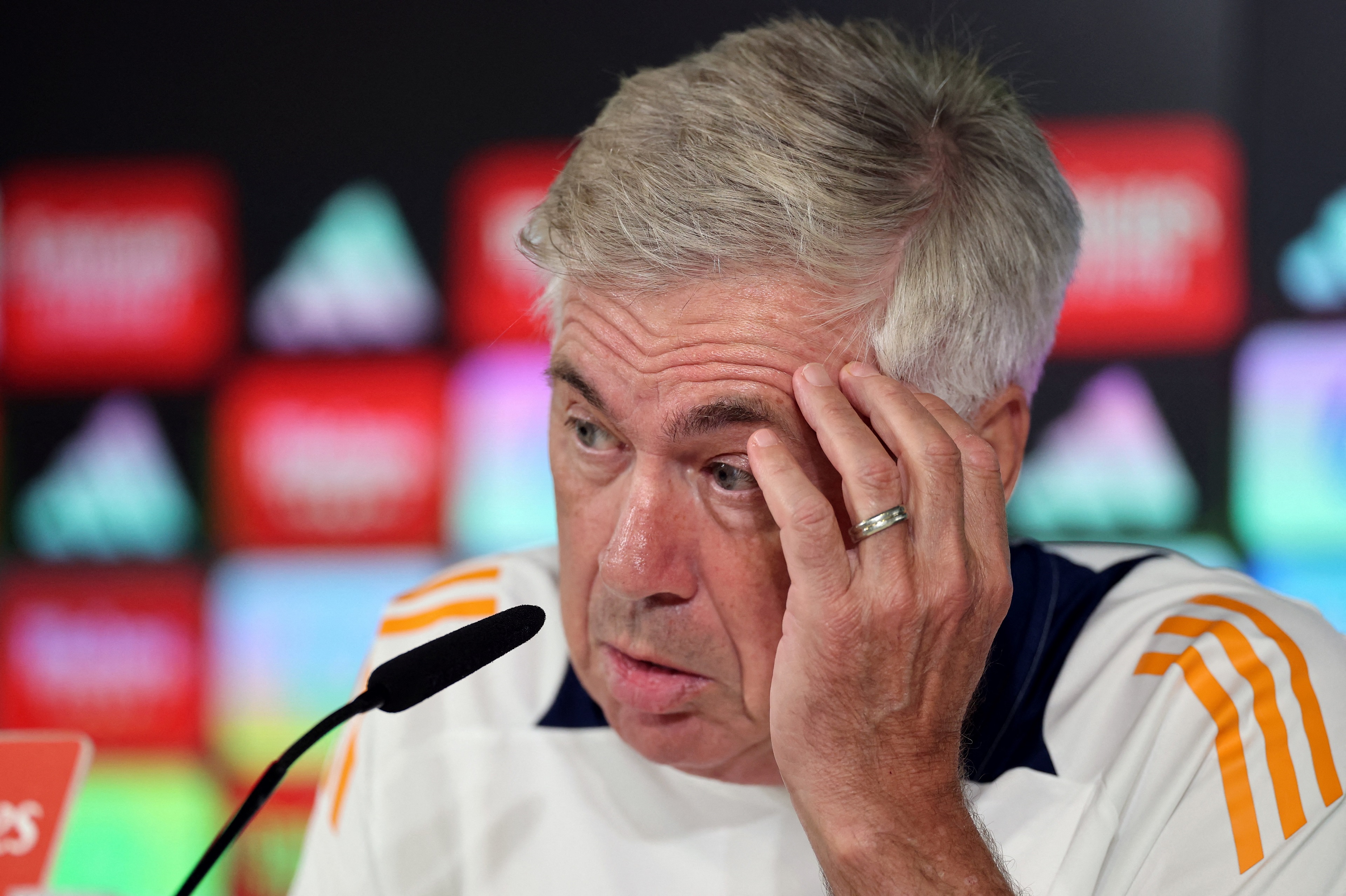 Real Madrid's Italian coach Carlo Ancelotti speaks to media during a press conference on the eve of their Liga football match against Real Betis, at the club's training facilities of Valdebebas in Madrid on August 31, 2024.