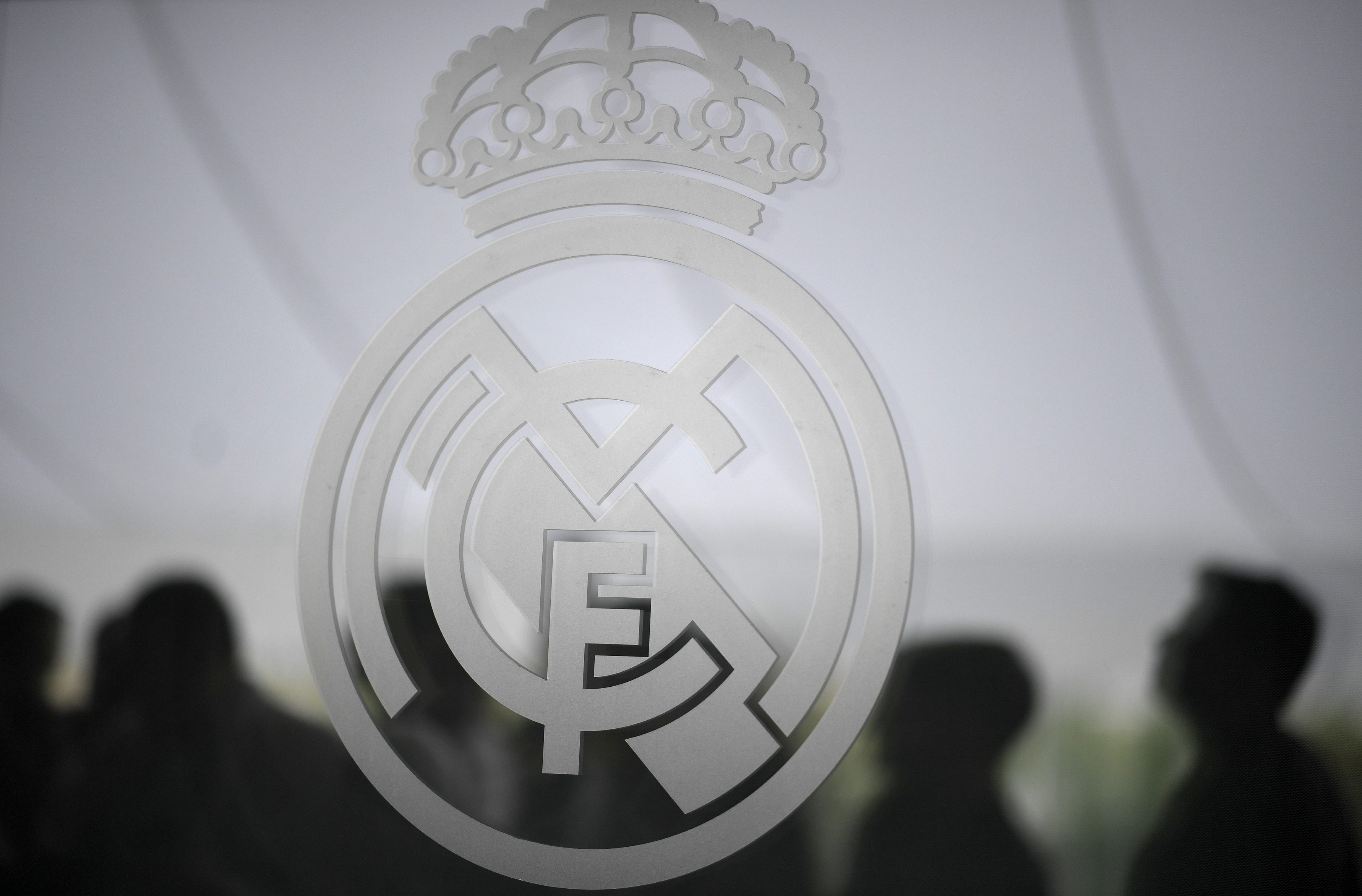 Picture shows Real Madrid CF's badge on a window during Real Madrid's Media Open Day ahead of their UEFA Champions league final footbal match against Liverpool FC, in Madrid on May 22, 2018.