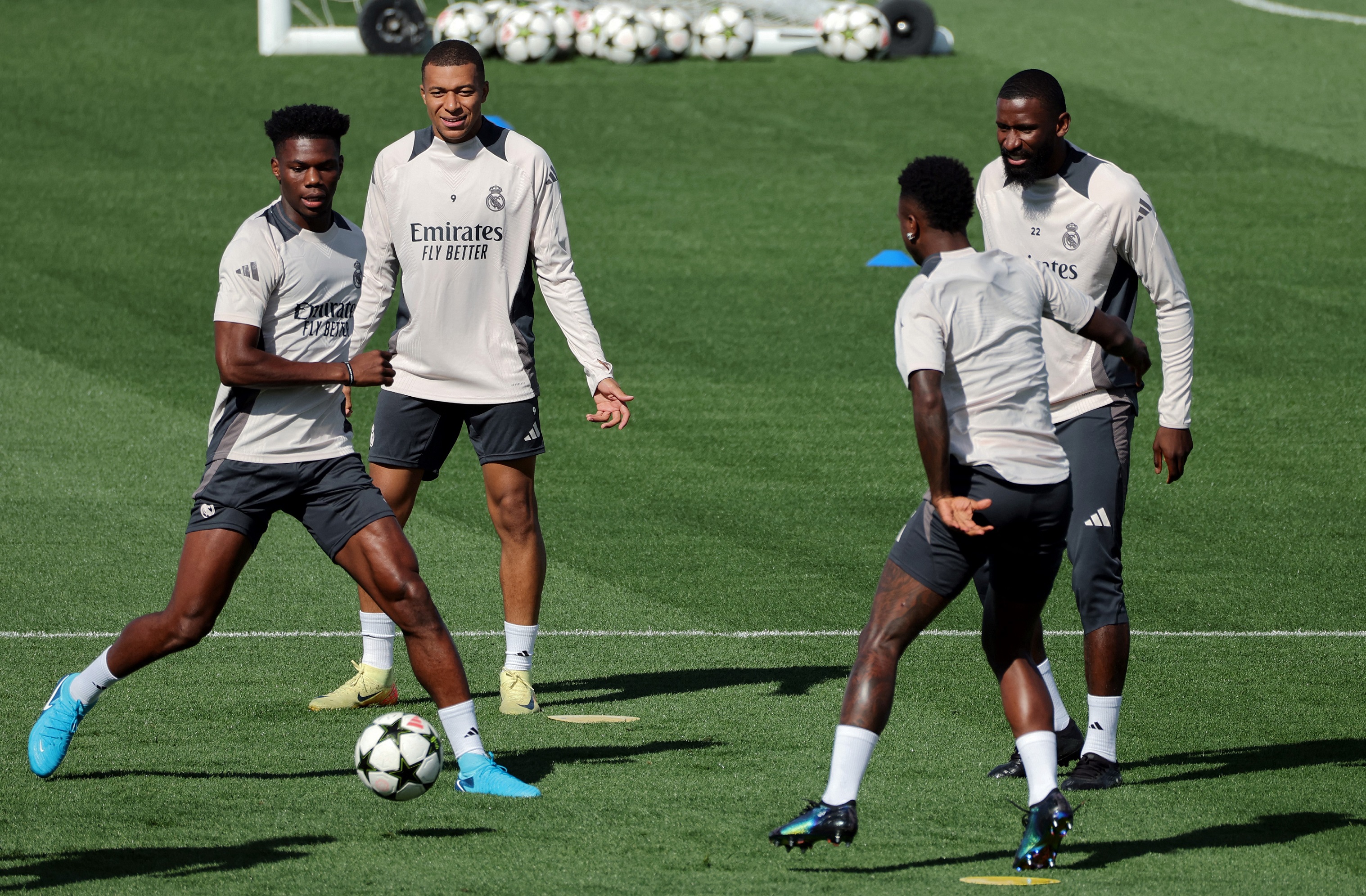 (from L) Real Madrid's French midfielder #14 Aurelien Tchouameni, Real Madrid's French forward #09 Kylian Mbappe, Real Madrid's Brazilian forward #07 Vinicius Junior and Real Madrid's German defender #22 Antonio Ruediger attend a training session on the eve of their UEFA Champions League football match against Stuttgart VFB at the club's training facilities of Valdebebas, in the outskirt of Madrid, on September 16, 2024.
