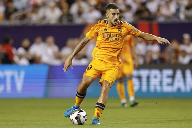Real Madrid's midfielder #19 Dani Ceballos controls the ball during the second half of the pre-season club friendly football match between AC Milan and Real Madrid at Soldier Field in Chicago, Illinois on July 31, 2024.