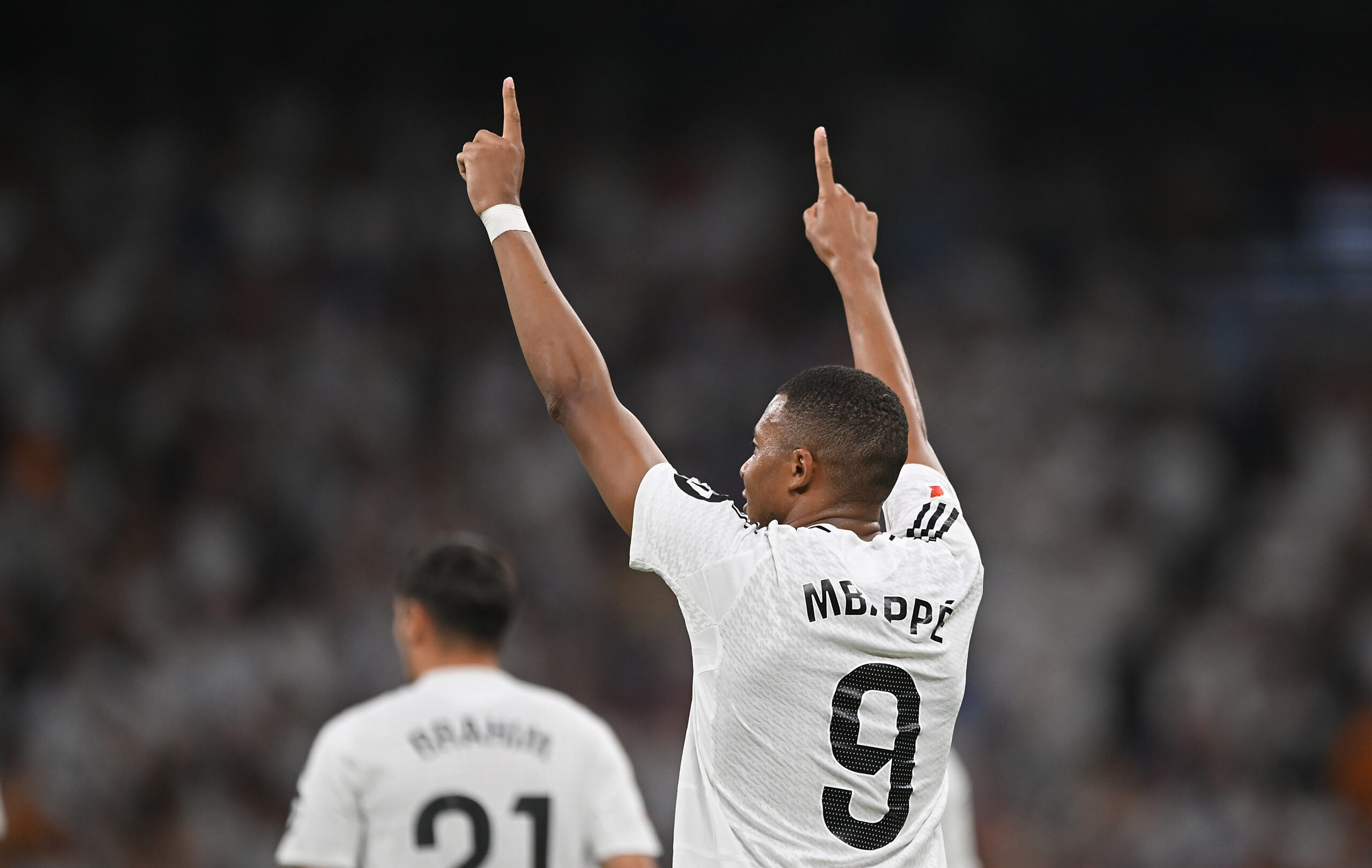 MADRID, SPAIN - SEPTEMBER 01: Kylian Mbappe of Real Madrid celebrates after scoring his team's first goal during the LaLiga match between Real Madrid CF and Real Betis Balompie at Estadio Santiago Bernabeu on September 01, 2024 in Madrid, Spain.