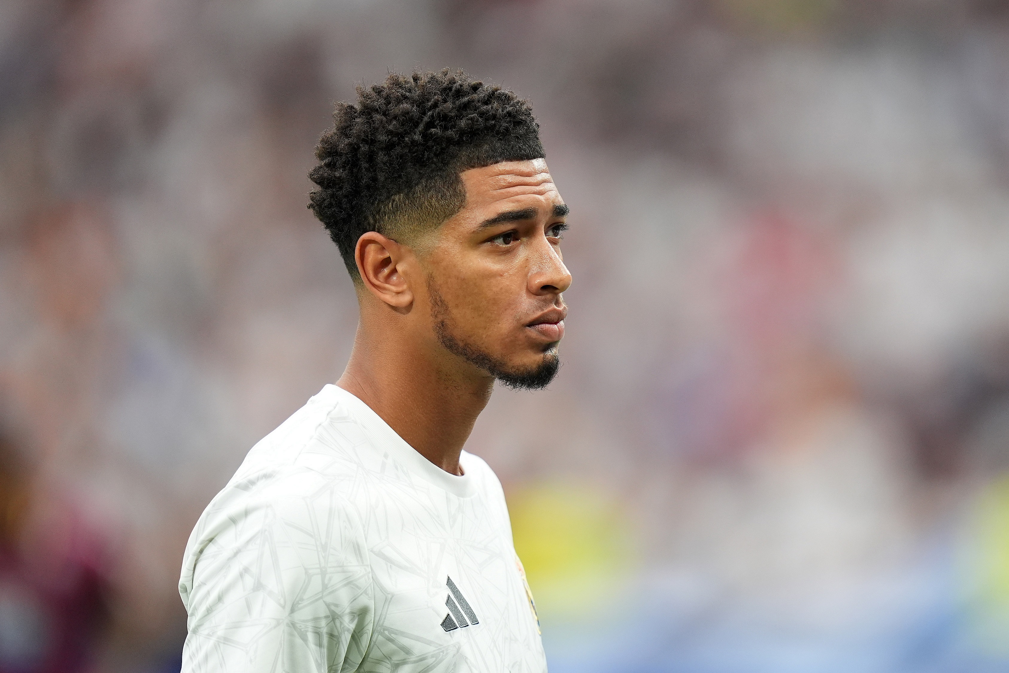 MADRID, SPAIN - AUGUST 25: Jude Bellingham of Real Madrid looks on prior to the La Liga match between Real Madrid CF and Real Valladolid CF at Estadio Santiago Bernabeu on August 25, 2024 in Madrid, Spain.