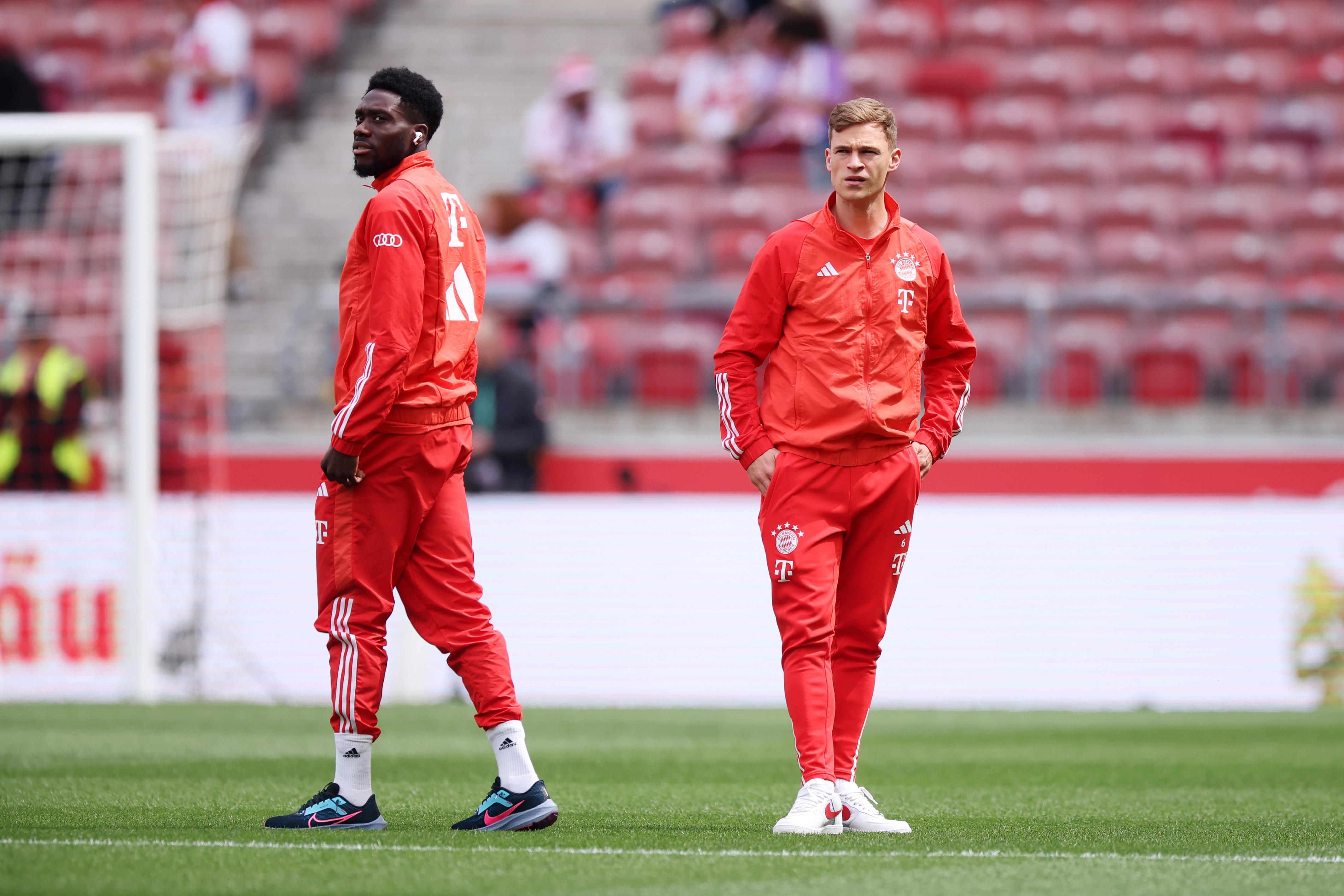 STUTTGART, GERMANY - MAY 04: Alphonso Davies and Joshua Kimmich of Bayern Munich inspect the pitch prior to the Bundesliga match between VfB Stuttgart and FC Bayern München at MHPArena on May 04, 2024 in Stuttgart, Germany.