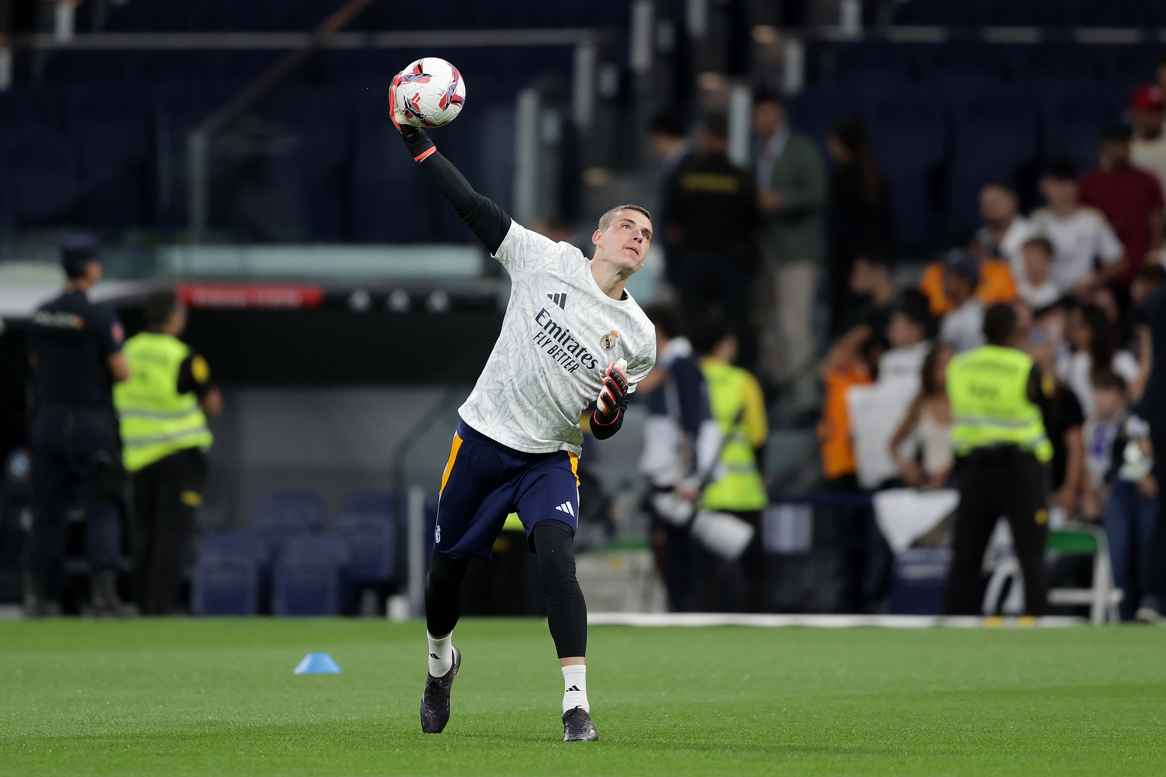 MADRID, SPAIN - SEPTEMBER 24: Goalkeeper Andriy Lunin of Real Madrid CF warms up before the LaLiga match between Real Madrid CF and Deportivo Alaves at Estadio Santiago Bernabeu on September 24, 2024 in Madrid, Spain.