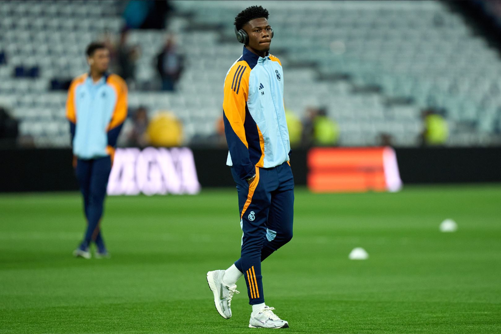 MADRID, SPAIN - OCTOBER 26: Aurelien Tchouameni of Real Madrid inspects the pitch prior to the LaLiga match between Real Madrid CF and FC Barcelona at Estadio Santiago Bernabeu on October 26, 2024 in Madrid, Spain.