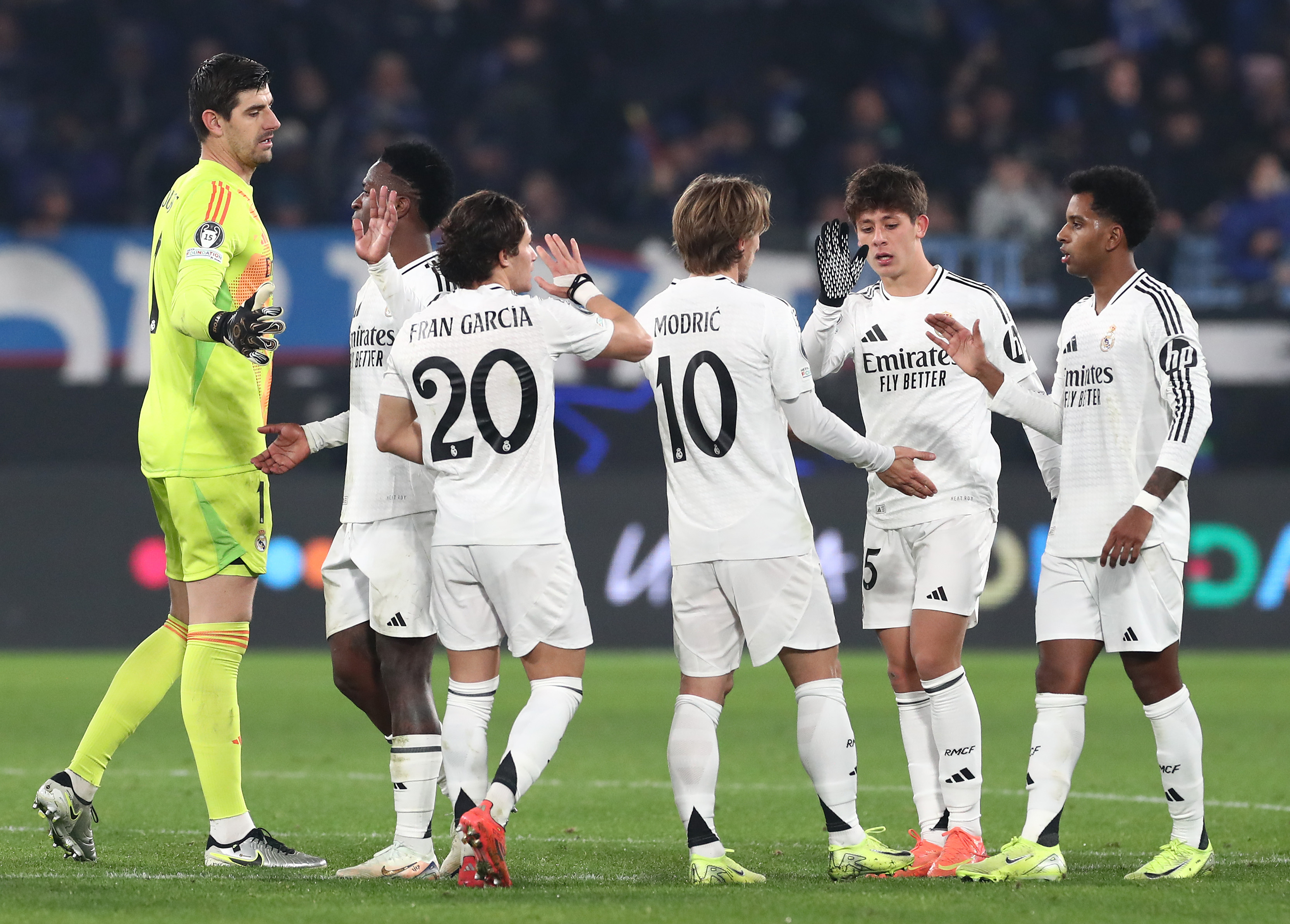 BERGAMO, ITALY - DECEMBER 10: The players of Real Madrid interact at full-time following the team's victory in the UEFA Champions League 2024/25 League Phase MD6 match between Atalanta BC and Real Madrid C.F. at Stadio di Bergamo on December 10, 2024 in Bergamo, Italy.