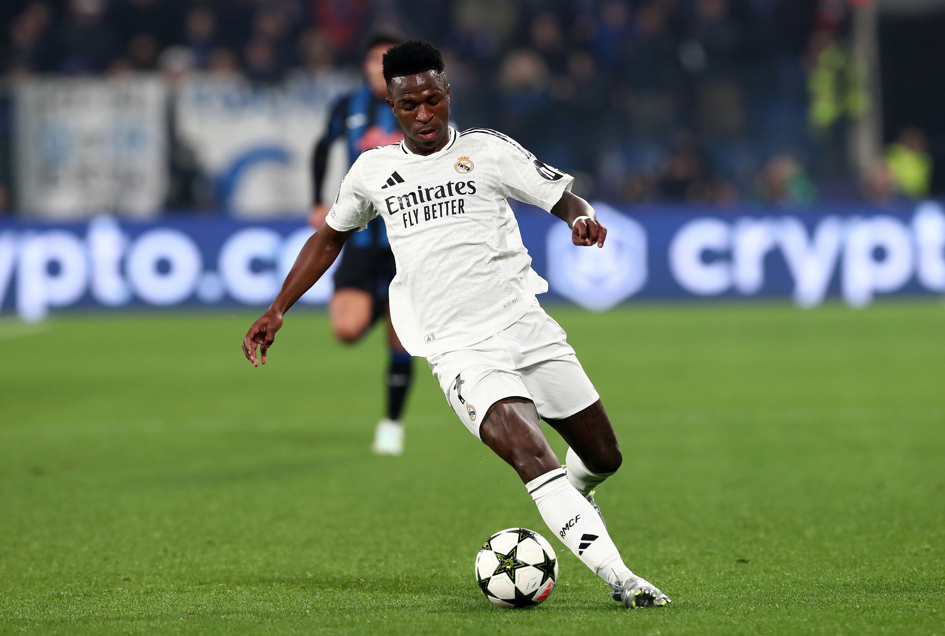 BERGAMO, ITALY - DECEMBER 10: Vinicius Junior of Real Madrid controls the ball during the UEFA Champions League 2024/25 League Phase MD6 match between Atalanta BC and Real Madrid C.F. at Stadio di Bergamo on December 10, 2024 in Bergamo, Italy.