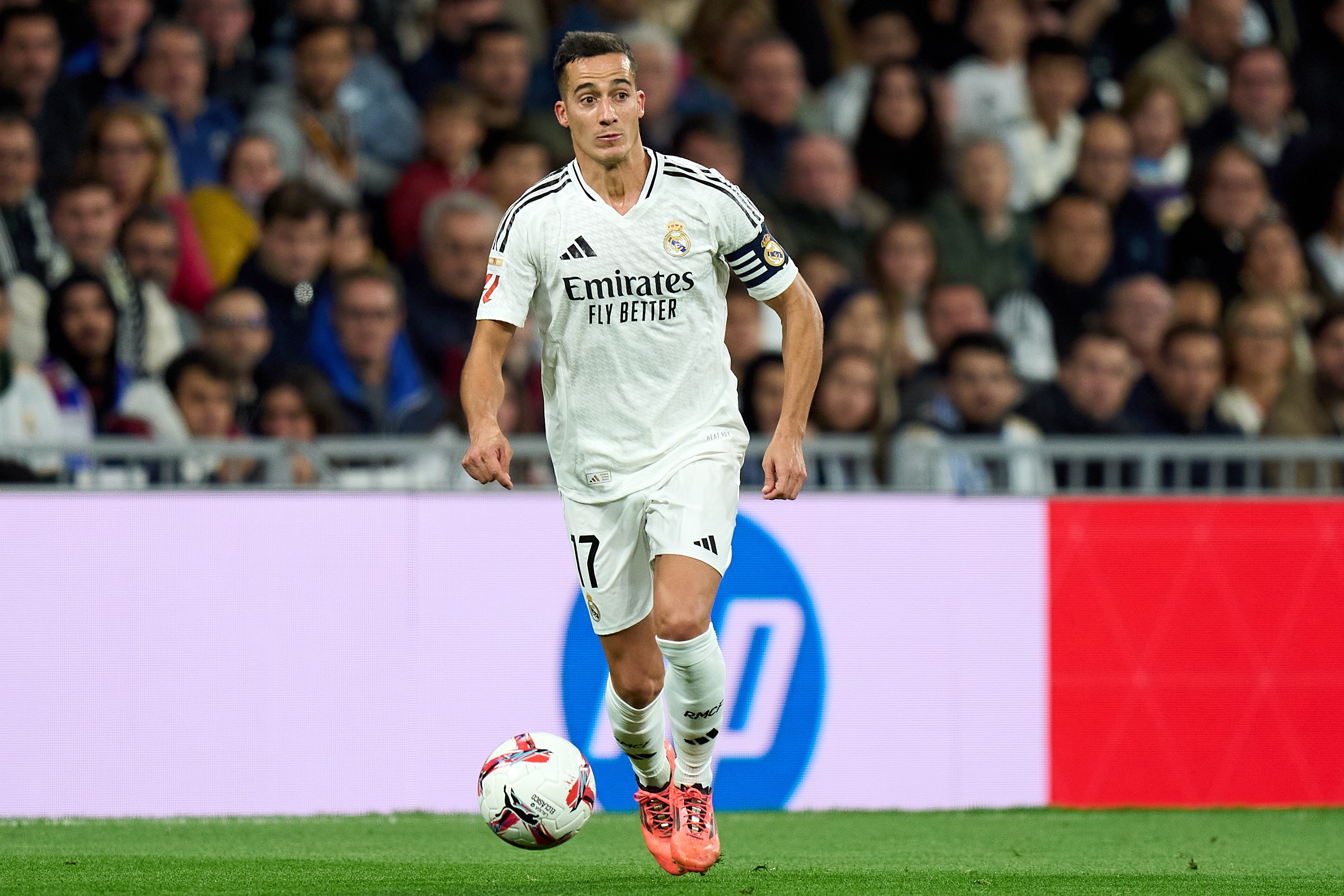 MADRID, SPAIN - OCTOBER 26: Lucas Vazquez of Real Madrid runs with the ball during the LaLiga match between Real Madrid CF and FC Barcelona at Estadio Santiago Bernabeu on October 26, 2024 in Madrid, Spain.