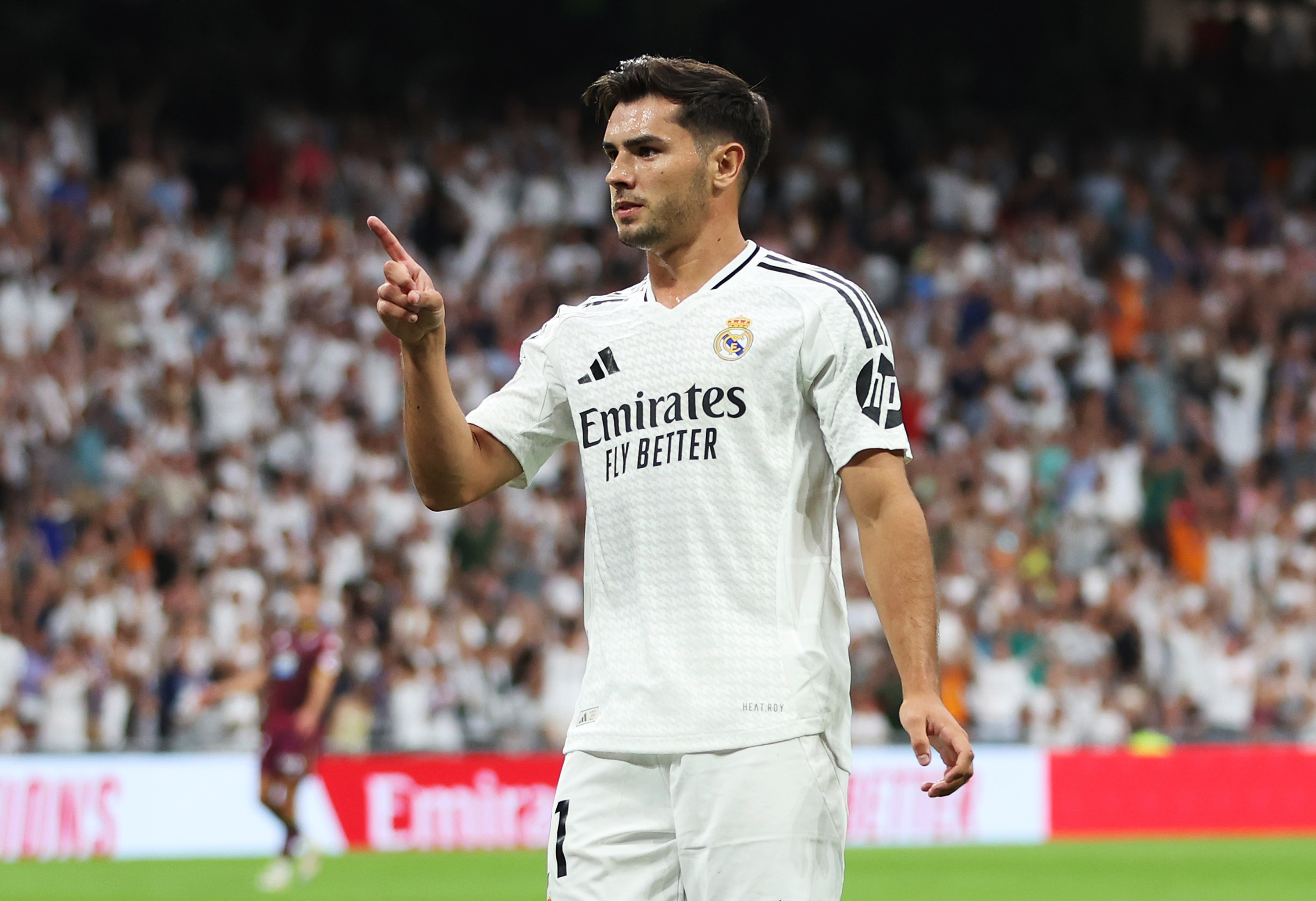 MADRID, SPAIN - AUGUST 25: Brahim Diaz of Real Madrid celebrates scoring his team's second goal during the La Liga match between Real Madrid CF and Real Valladolid CF at Estadio Santiago Bernabeu on August 25, 2024 in Madrid, Spain.
