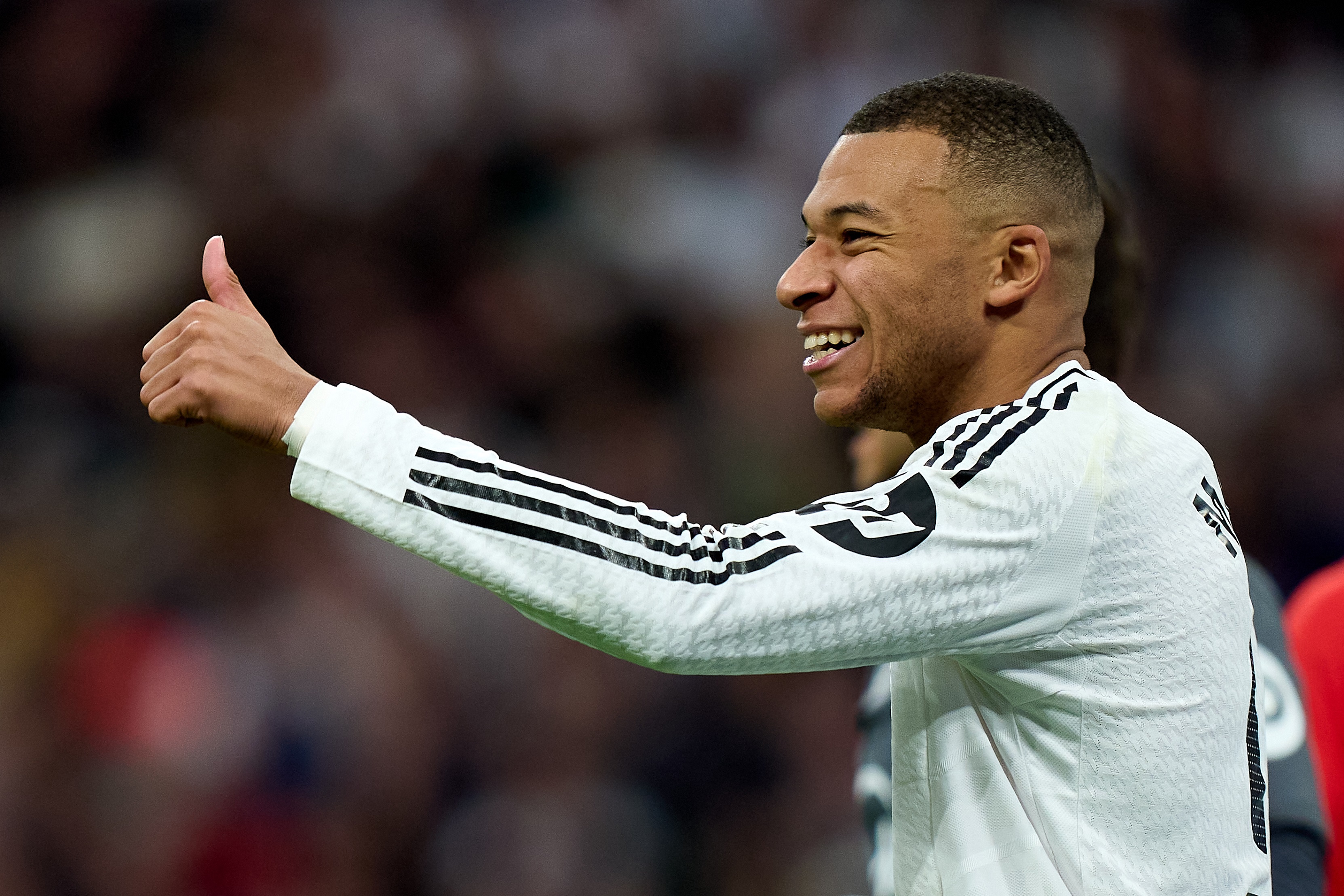 MADRID, SPAIN - DECEMBER 22: Kylian Mbappe of Real Madrid gestures during the LaLiga match between Real Madrid CF and Sevilla FC at Estadio Santiago Bernabeu on December 22, 2024 in Madrid, Spain.