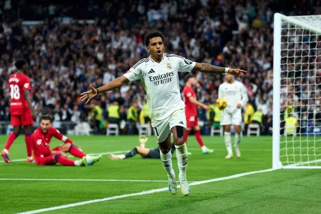 MADRID, SPAIN - DECEMBER 22: Rodrygo Goes of Real Madrid celebrates after scoring his team's third goal during the LaLiga match between Real Madrid CF and Sevilla FC at Estadio Santiago Bernabeu on December 22, 2024 in Madrid, Spain.