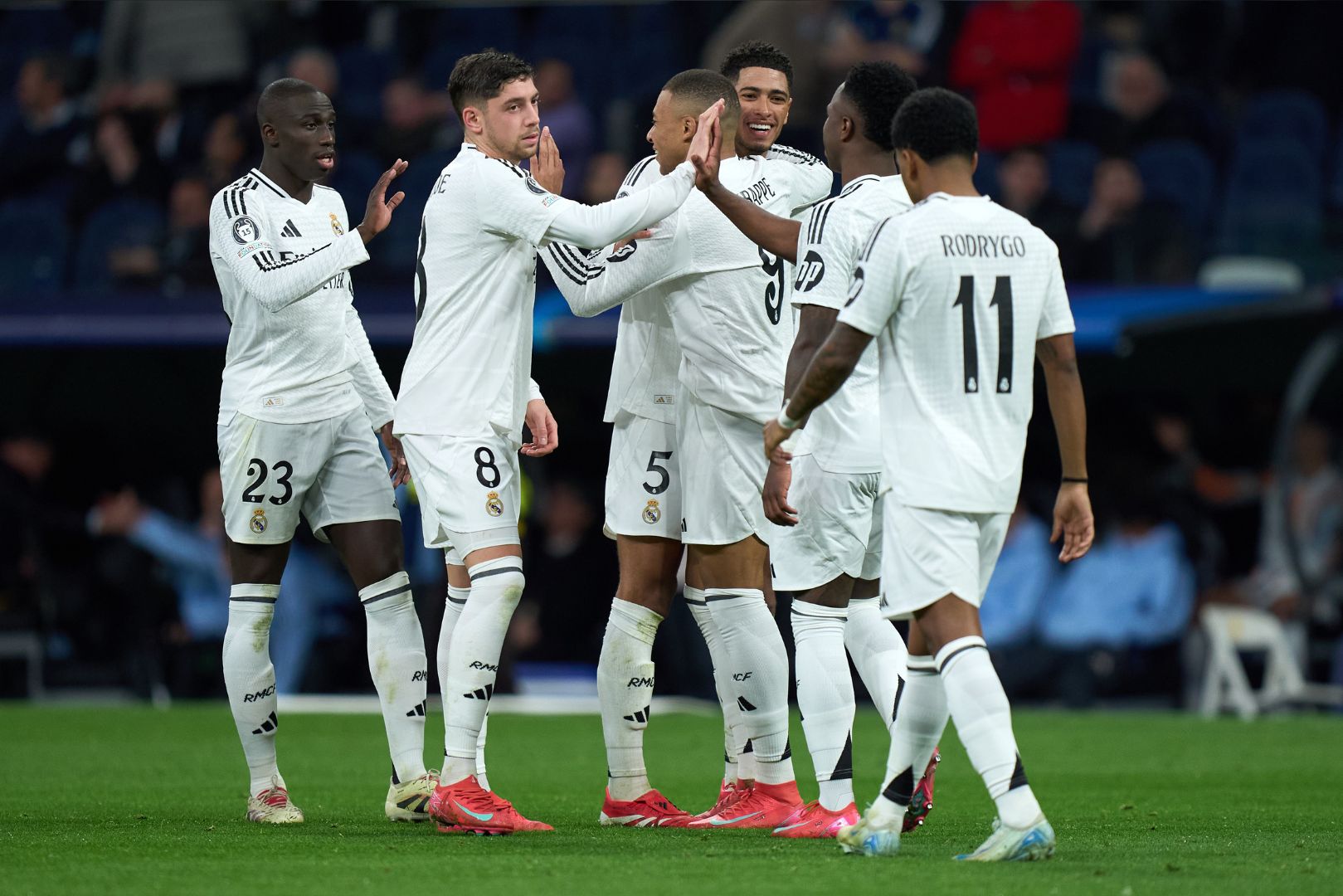 MADRID, SPAIN - JANUARY 22: Kylian Mbappe of Real Madrid celebrates scoring his team's third goal with teammates during the UEFA Champions League 2024/25 League Phase MD7 match between Real Madrid C.F. and FC Salzburg at Estadio Santiago Bernabeu on January 22, 2025 in Madrid, Spain.