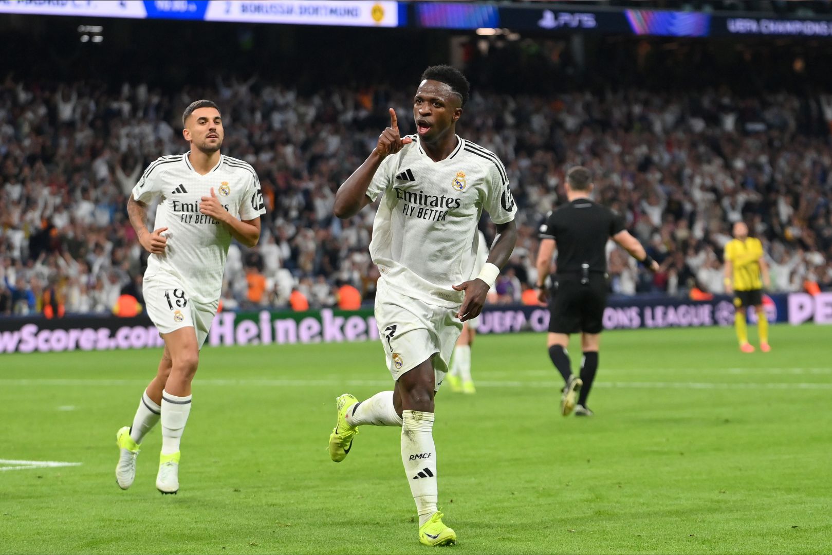 MADRID, SPAIN - OCTOBER 22: Vinicius Junior of Real Madrid celebrates scoring his team's fifth goal during the UEFA Champions League 2024/25 League Phase MD3 match between Real Madrid C.F. and Borussia Dortmund at Estadio Santiago Bernabeu on October 22, 2024 in Madrid, Spain.