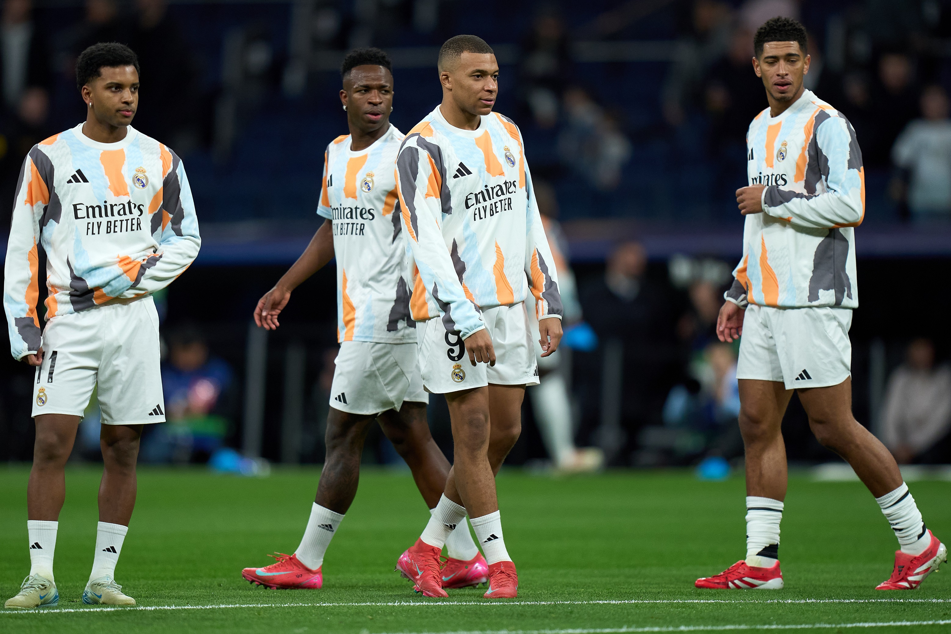 MADRID, SPAIN - JANUARY 22: Rodrygo Goes, Vinicius Junior, Kylian Mbappe and Jude Bellingham of Real Madrid look on as they warm up prior to the UEFA Champions League 2024/25 League Phase MD7 match between Real Madrid C.F. and FC Salzburg at Estadio Santiago Bernabeu on January 22, 2025 in Madrid, Spain.