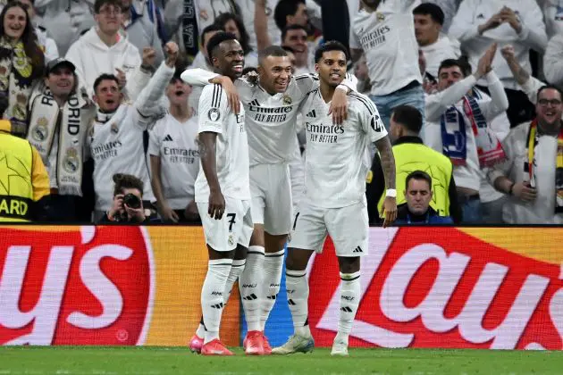MADRID, SPAIN - JANUARY 22: Kylian Mbappe of Real Madrid celebrates scoring his team's third goal with teammates Vinicius Junior and Rodrygo during the UEFA Champions League 2024/25 League Phase MD7 match between Real Madrid C.F. and FC Salzburg at Estadio Santiago Bernabeu on January 22, 2025 in Madrid, Spain.