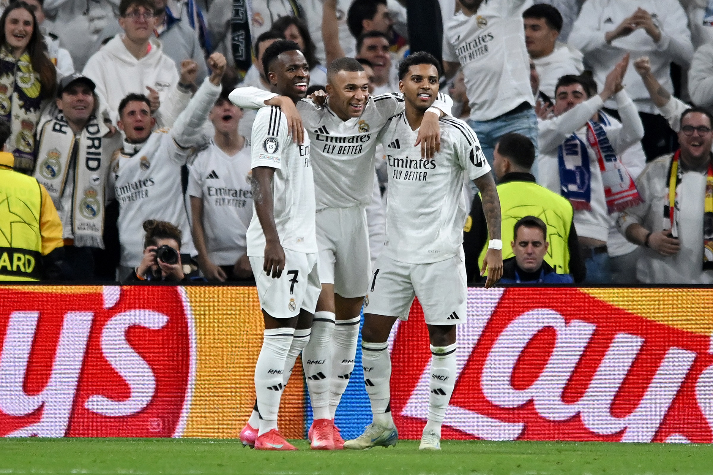 MADRID, SPAIN - JANUARY 22: Kylian Mbappe of Real Madrid celebrates scoring his team's third goal with teammates Vinicius Junior and Rodrygo during the UEFA Champions League 2024/25 League Phase MD7 match between Real Madrid C.F. and FC Salzburg at Estadio Santiago Bernabeu on January 22, 2025 in Madrid, Spain.