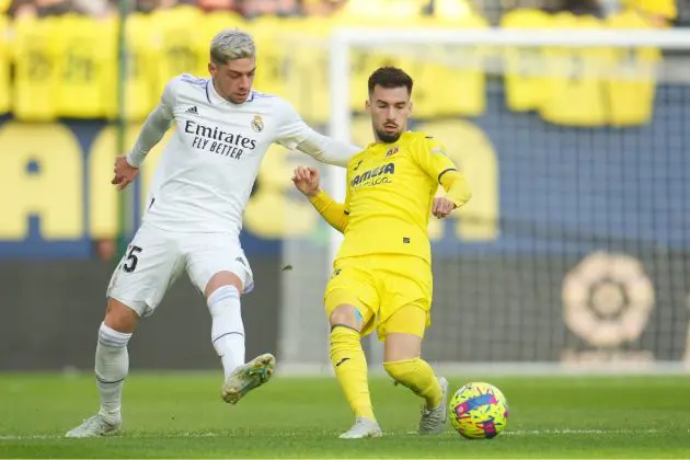 VILLARREAL, SPAIN - JANUARY 07: Alex Baena of Villarreal CF is challenged by Federico Valverde of Real Madrid during the LaLiga Santander match between Villarreal CF and Real Madrid CF at Estadio de la Ceramica on January 07, 2023 in Villarreal, Spain.