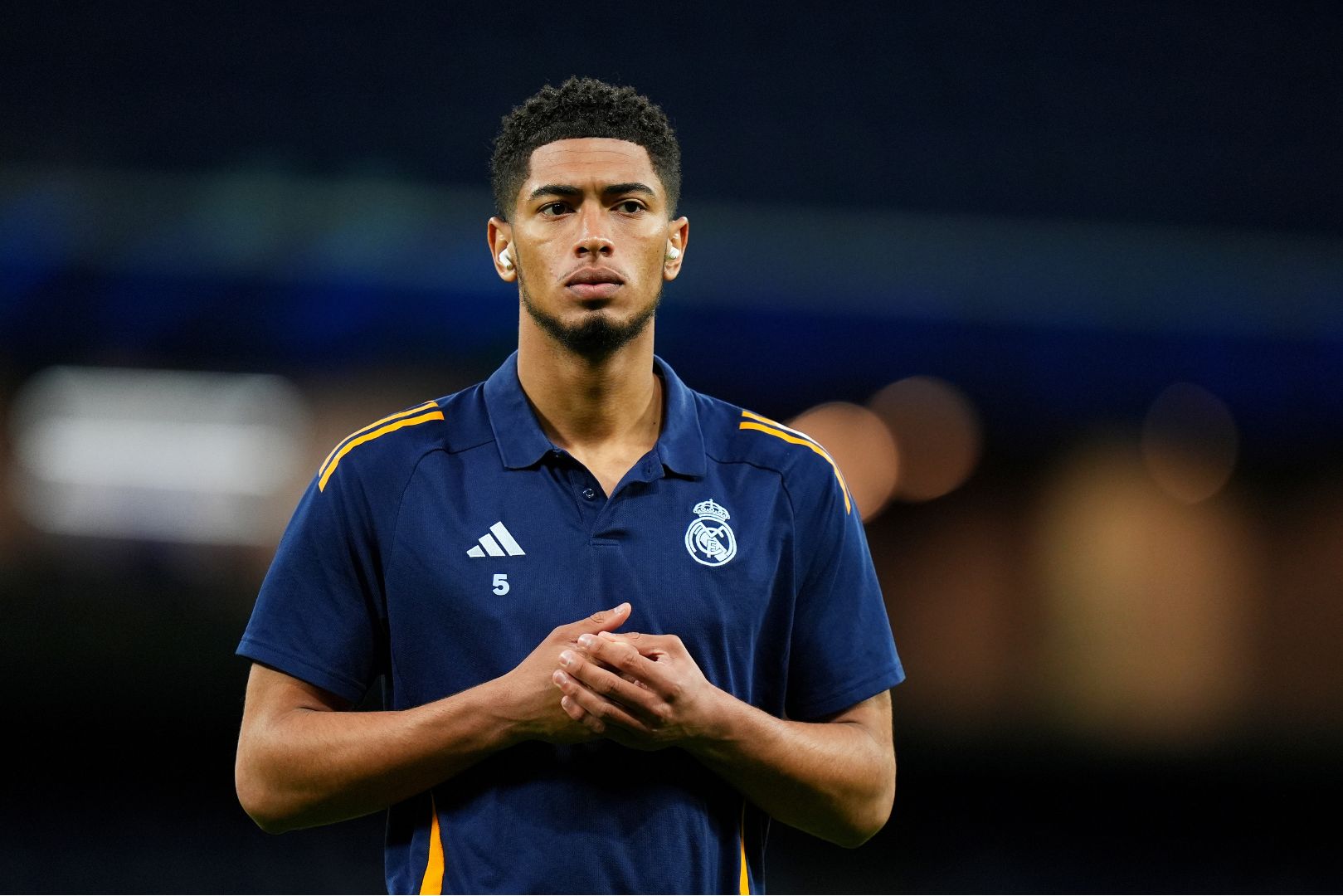 MADRID, SPAIN - MARCH 29: Jude Bellingham of Real Madrid looks on as he inspects the pitch prior to the LaLiga match between Real Madrid CF and CD Leganes at Estadio Santiago Bernabeu on March 29, 2025 in Madrid, Spain.
