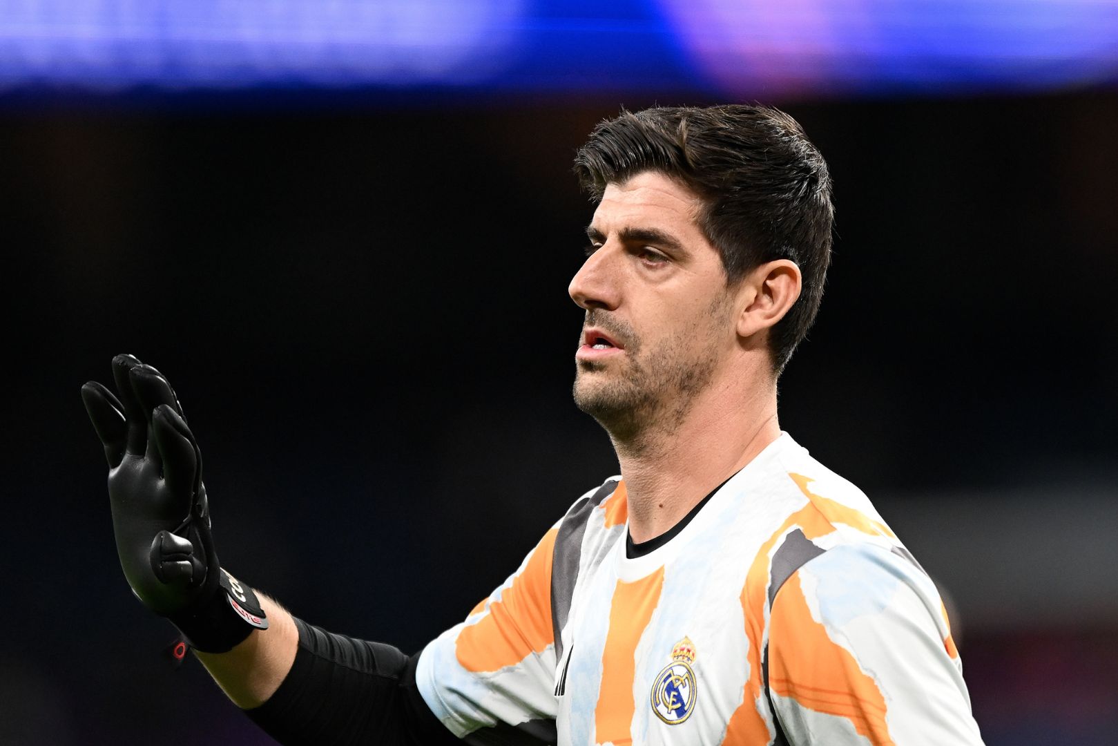 MADRID, SPAIN - MARCH 04: Thibaut Courtois of Real Madrid salutes fans prior to the UEFA Champions League 2024/25 UEFA Champions League 2024/25 Round of 16 first leg match between Real Madrid C.F. and Atletico de Madrid at on March 04, 2025 in Madrid, Spain.