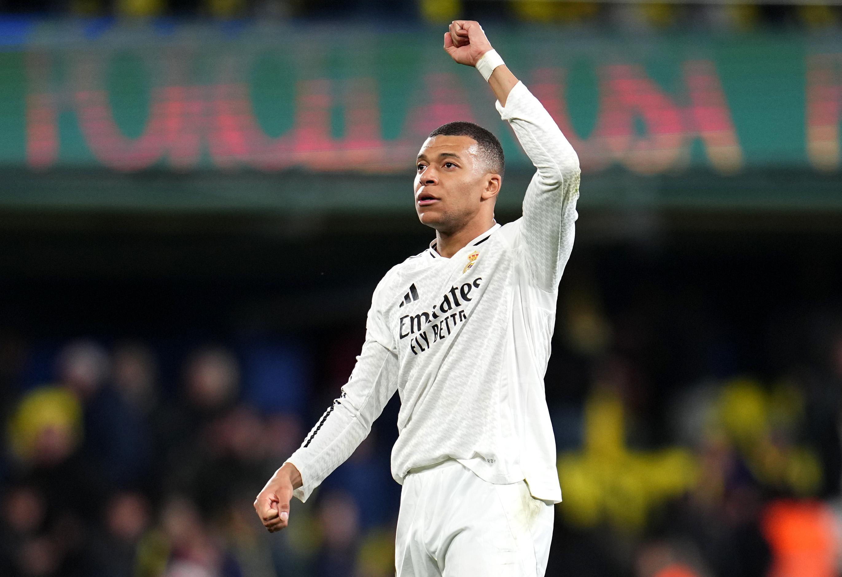 VILLARREAL, SPAIN - MARCH 15: Kylian Mbappe of Real Madrid celebrates victory after the LaLiga match between Villarreal CF and Real Madrid CF at Estadio de la Ceramica on March 15, 2025 in Villarreal, Spain.