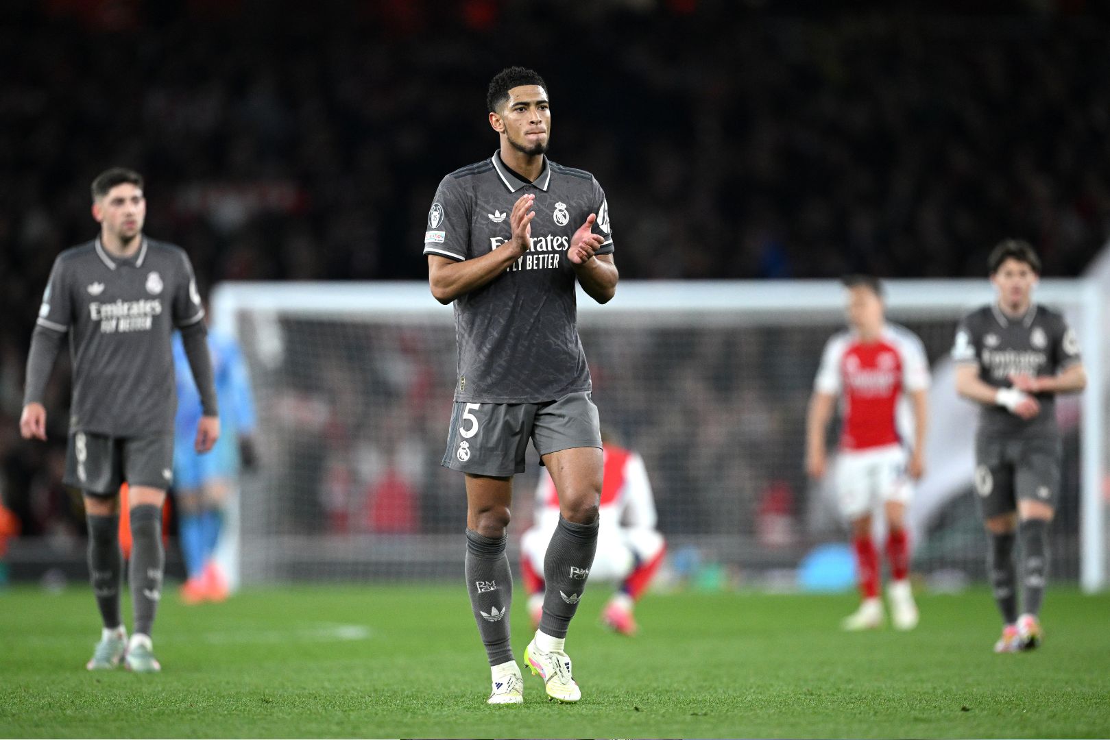LONDON, ENGLAND - APRIL 08: Jude Bellingham of Real Madrid acknowledges the fans after his team's 3-0 defeat in the UEFA Champions League 2024/25 Quarter Final First Leg match between Arsenal FC and Real Madrid C.F. at Emirates Stadium on April 08, 2025 in London, England.