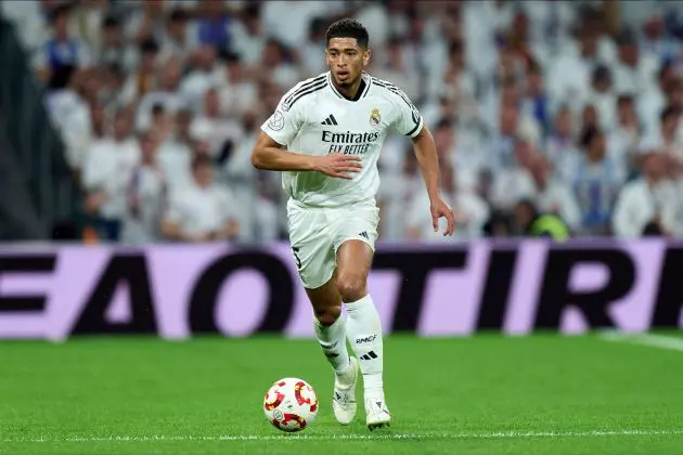 MADRID, SPAIN - APRIL 01: Jude Bellingham of Real Madrid runs with the ball during the Copa del Rey semifinal match between Real Madrid and Real Sociedad at Estadio Santiago Bernabeu on April 01, 2025 in Madrid, Spain.