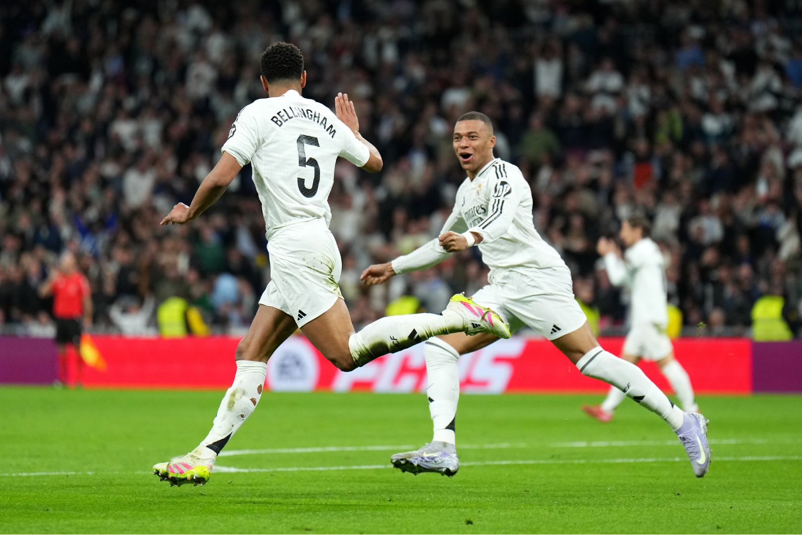 MADRID, SPAIN - MARCH 29: Jude Bellingham of Real Madrid celebrates scoring his team's second goal with Kylian Mbappe during the LaLiga match between Real Madrid CF and CD Leganes at Estadio Santiago Bernabeu on March 29, 2025 in Madrid, Spain.