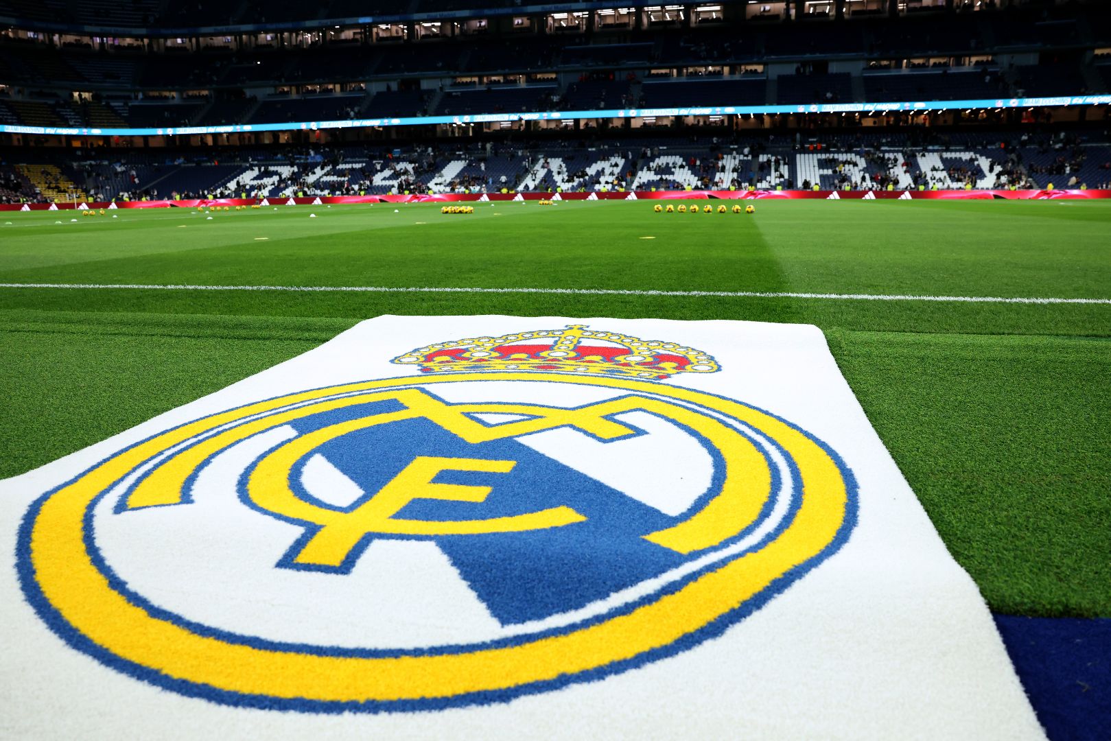 MADRID, SPAIN - FEBRUARY 08: General view inside the stadium, as the Real Madrid emblem is seen on the side of the pitch prior to the LaLiga match between Real Madrid CF and Atletico de Madrid at Estadio Santiago Bernabeu on February 08, 2025 in Madrid, Spain.