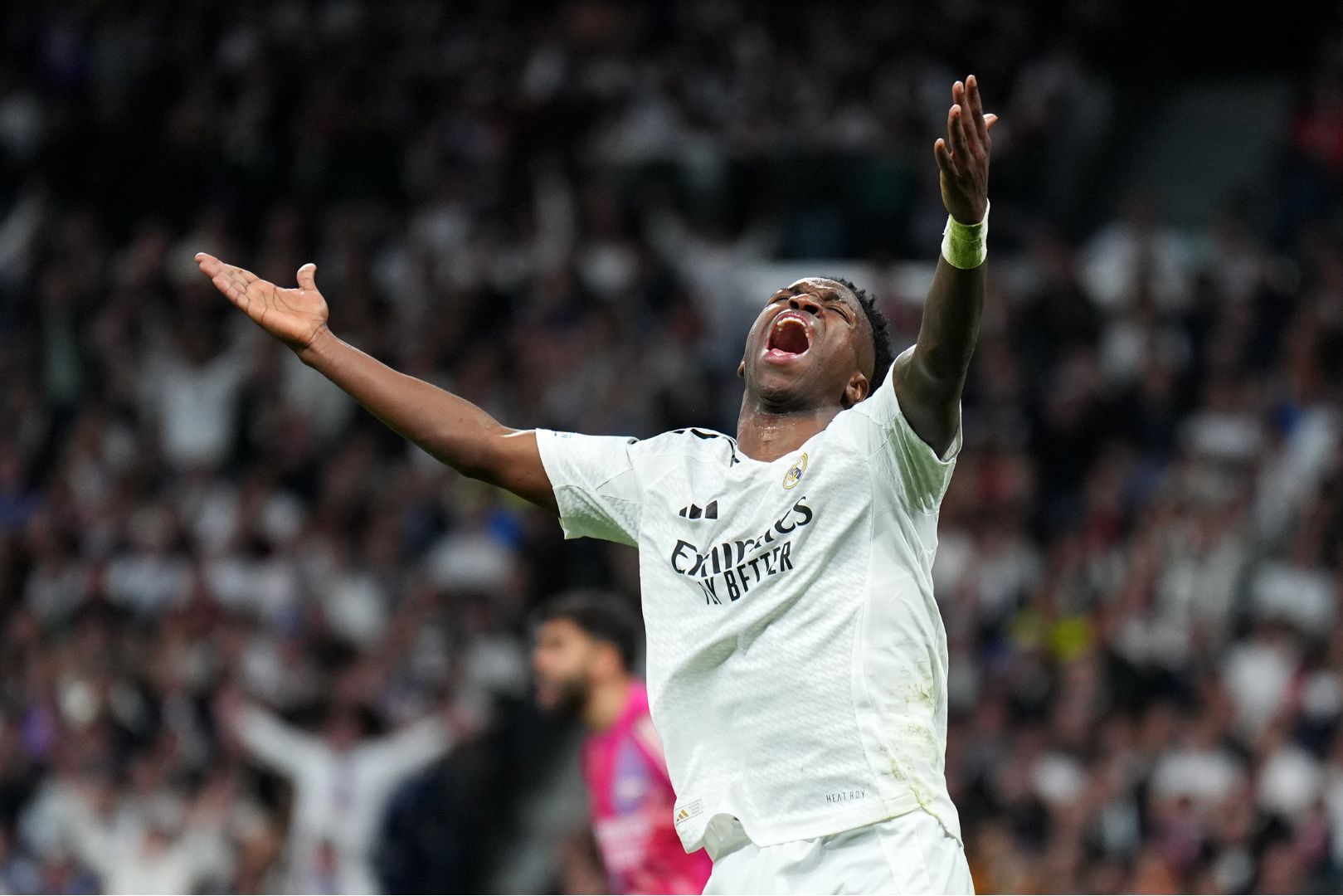 MADRID, SPAIN - APRIL 16: Vinicius Junior of Real Madrid reacts during the UEFA Champions League 2024/25 Quarter Final Second Leg match between Real Madrid C.F. and Arsenal FC at Estadio Santiago Bernabeu on April 16, 2025 in Madrid, Spain.