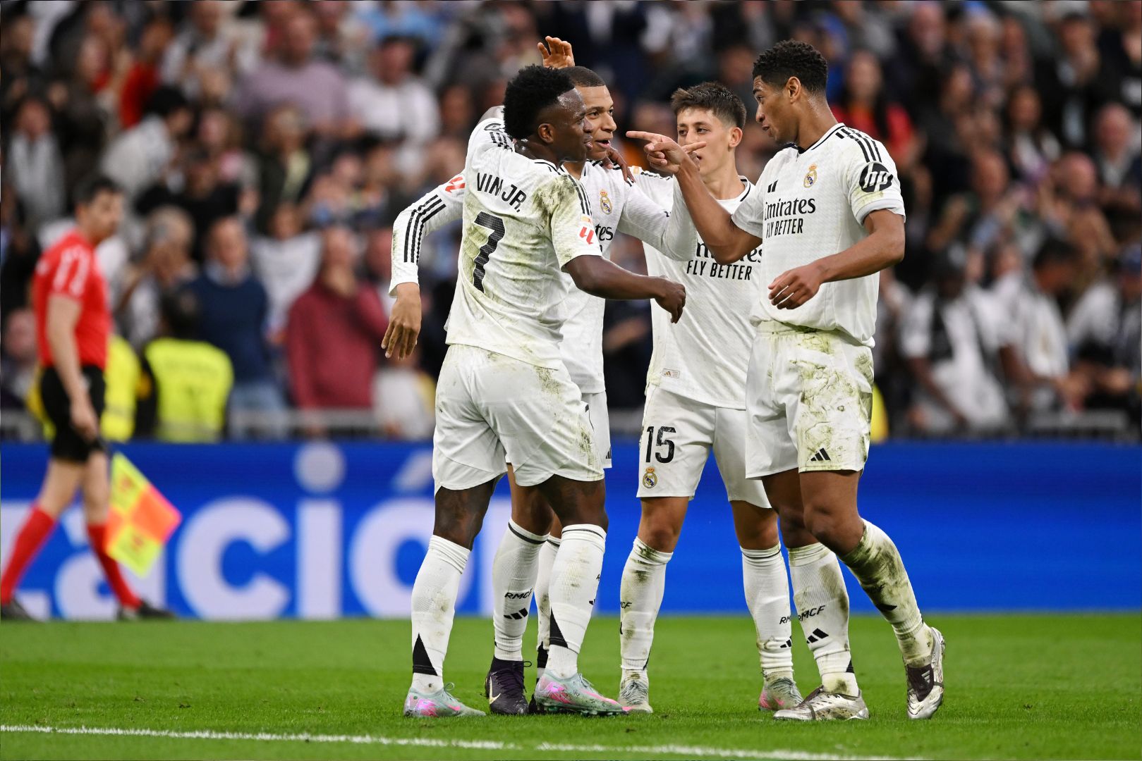 MADRID, SPAIN - MAY 04: Kylian Mbappe of Real Madrid celebrates scoring his team's second goal with teammates Vinicius Junior, Arda Gueler and Jude Bellingham during the LaLiga match between Real Madrid CF and RC Celta de Vigo at Estadio Santiago Bernabeu on May 04, 2025 in Madrid, Spain.