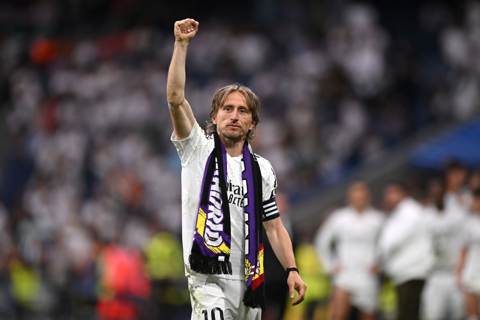 MADRID, SPAIN - MAY 24: Luka Modric of Real Madrid shows appreciation to the fans following his final appearance for Real Madrid after the LaLiga match between Real Madrid CF and Real Sociedad at Estadio Santiago Bernabeu on May 24, 2025 in Madrid, Spain.