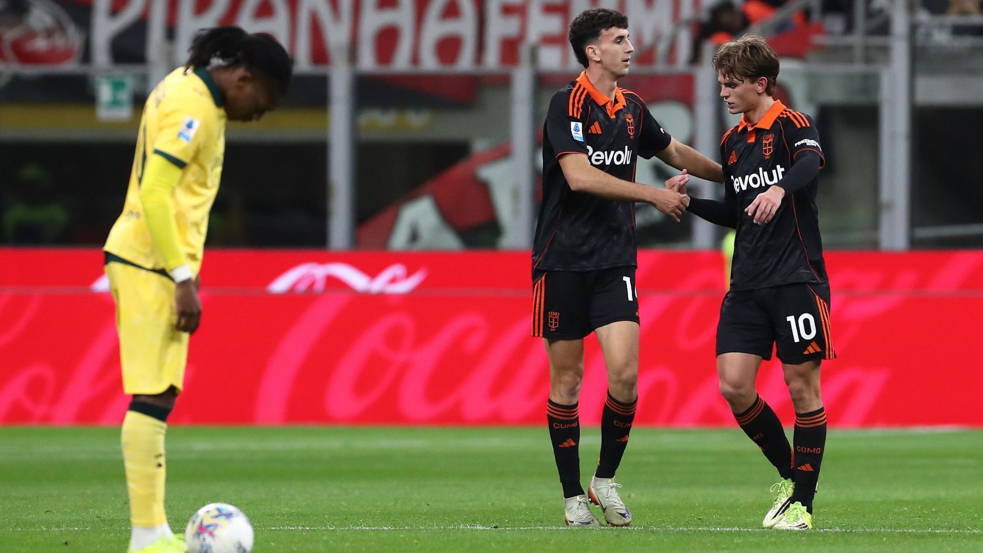 Nico Paz of Como 1907 celebrates scoring his team's first goal with teammate Jacobo Ramon during the Serie A match between AC Milan and Como 1907 at Giuseppe Meazza Stadium on February 18, 2026 in Milan, Italy.