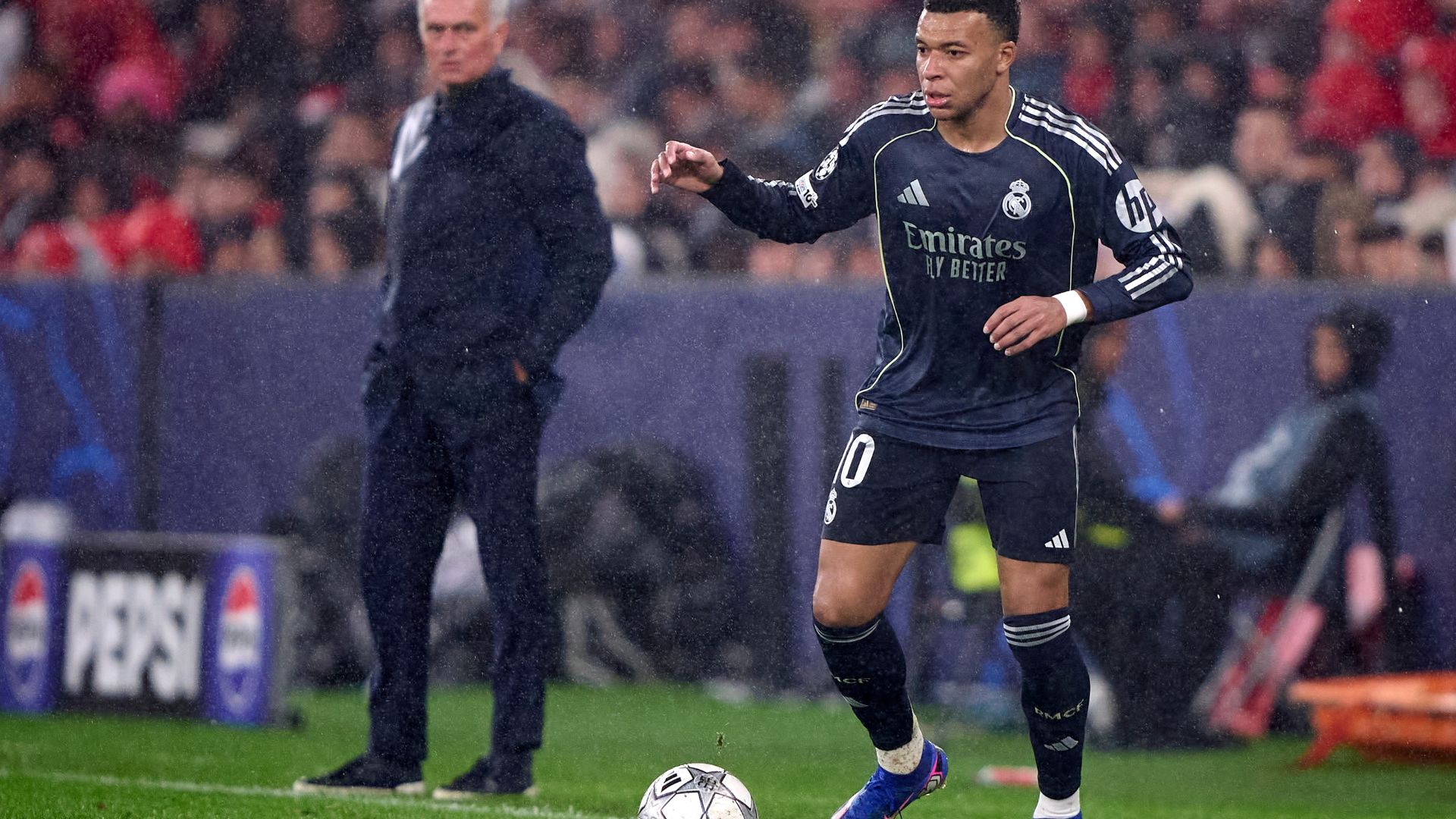Jose Mourinho, Head Coach of SL Benfica watches Kylian Mbappe of Real Madrid CF in action, during the UEFA Champions League 2025/26 League Phase MD8 match between SL Benfica and Real Madrid C.F. at Estadio Da Luz on January 28, 2026 in Lisbon, Portugal.